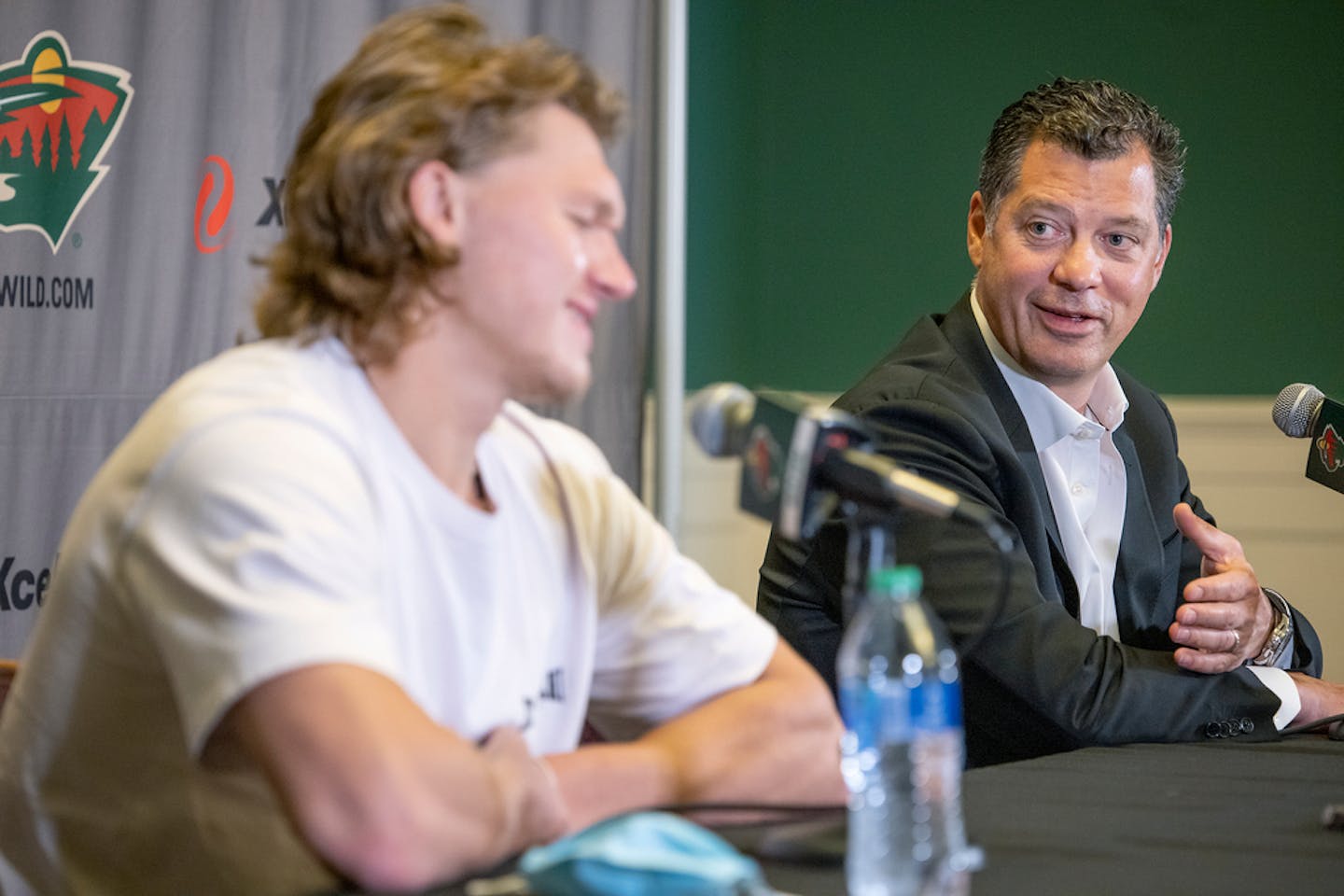 Wild General Manager Bill Guerin, right, and Kirill Kaprizov during a news conference in 2021.