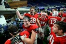Lakeville North football players celebrated their Class 6A title victory over Eden Prairie.
