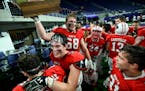 Lakeville North football players celebrated their Class 6A title victory over Eden Prairie.