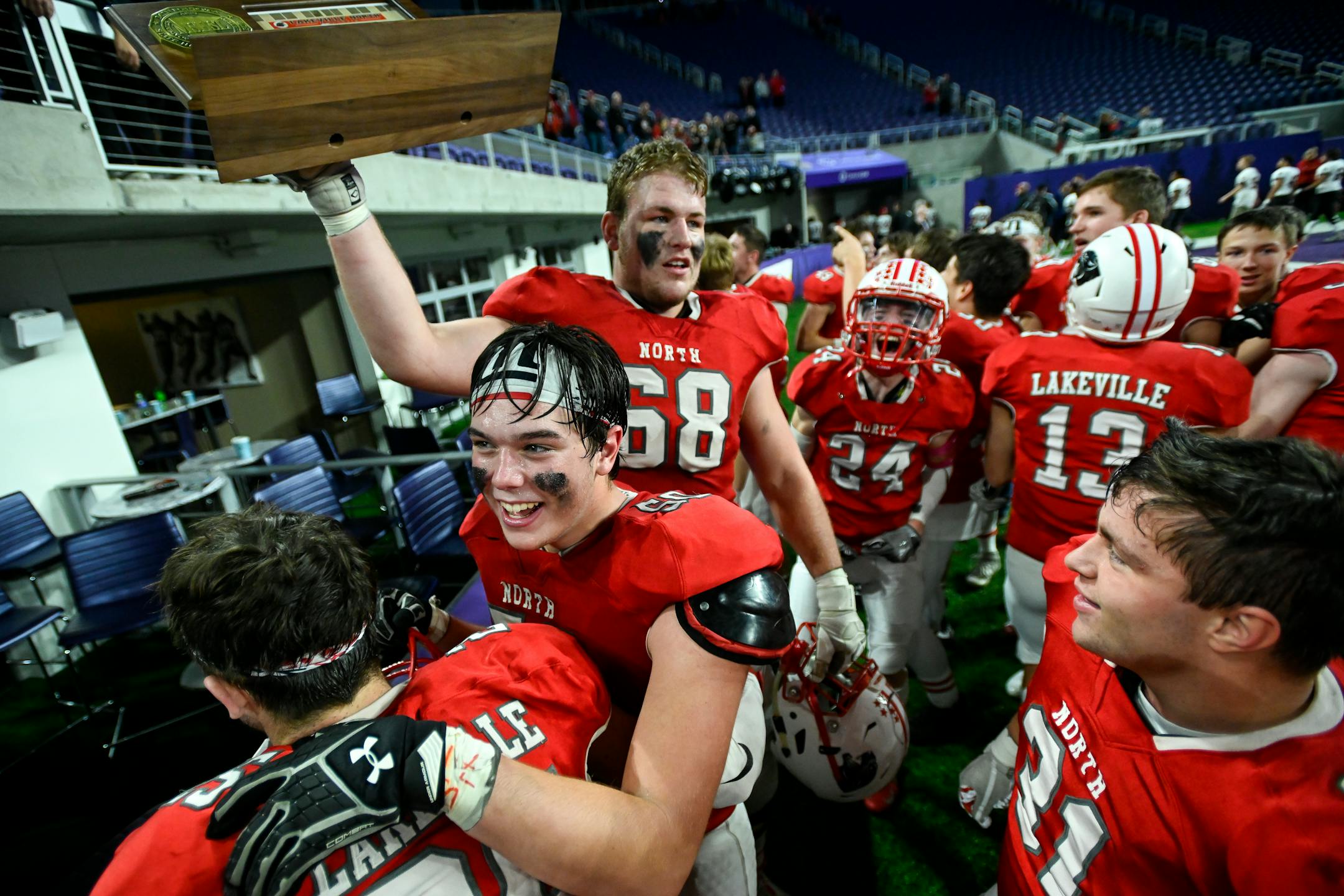 Lakeville North football players celebrated their Class 6A title victory over Eden Prairie.