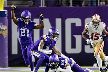 Minnesota Vikings safety Camryn Bynum (24) intercepts a pass in the final minute of the fourth quarter Monday, October 23, 2023, at U.S. Bank Stadium 