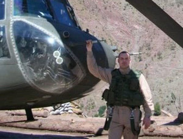 Allan Kelly of Duluth stood by his Chinook helicopter in Pakistan in 2005. He said he was one of three pilots with NBC anchor Brian Williams in 2003 a