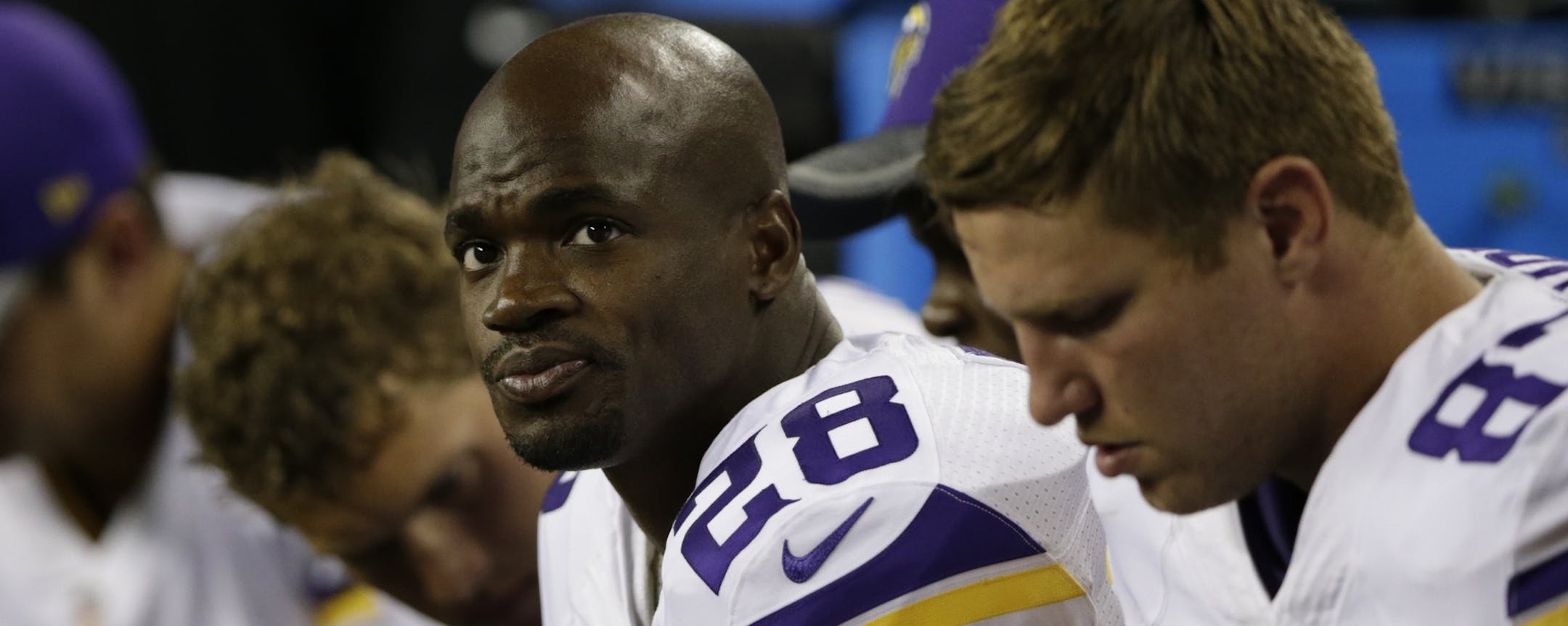 Minnesota Vikings running back Adrian Peterson (28) sits on the bench during a preseason NFL football game, Thursday, Aug. 18, 2016, in Seattle. (AP Photo/John Froschauer) ORG XMIT: MIN2016082515293419
