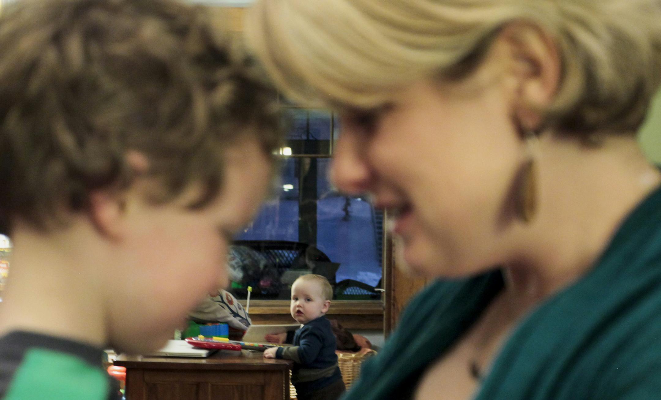 Jenna Zalk Berendzen, who suffered from severe depression after her first birth, with her sons Maxwell, 4, and Samuel, 1, at home in Cedar Falls, Iowa, Jan. 25, 2016. A panel of experts appointed by the Department of Health and Human Services is recommending screening for maternal mental illness in the wake of new evidence that maternal mental illness is more common than previously thought. (Brian C. Frank/The New York Times)