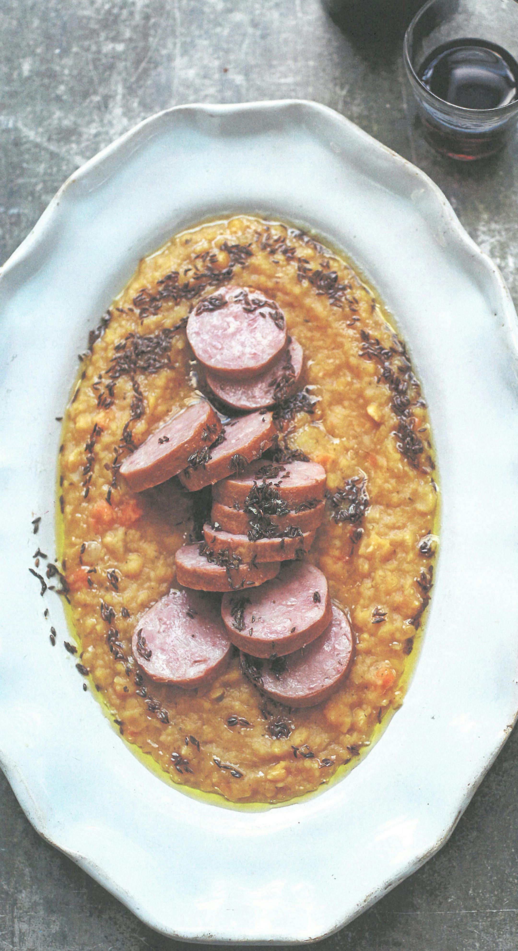 Laura Edwards
Smoked Sausage With Split Pea Puree and Caraway Butter, from "Simple: Effortless Food, Big Flavors."