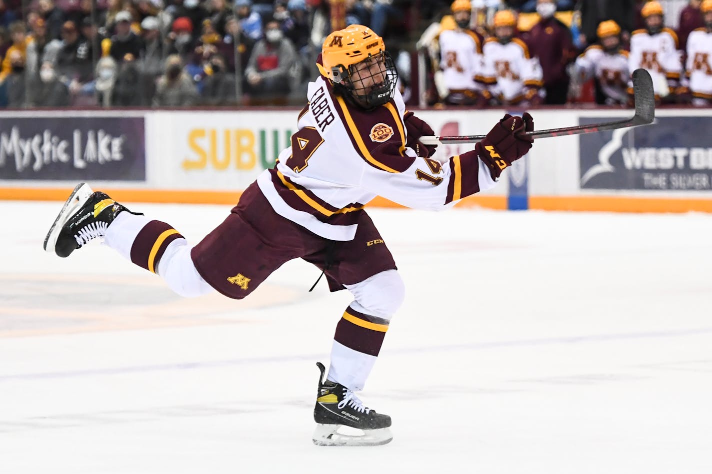 Minnesota defenseman Brock Faber (14) attempts a shot agains Wisconsin during the first period Friday, Feb. 25, 2022 at 3M Arena at Mariucci in Minneapolis, Minn. ] AARON LAVINSKY • aaron.lavinsky@startribune.com