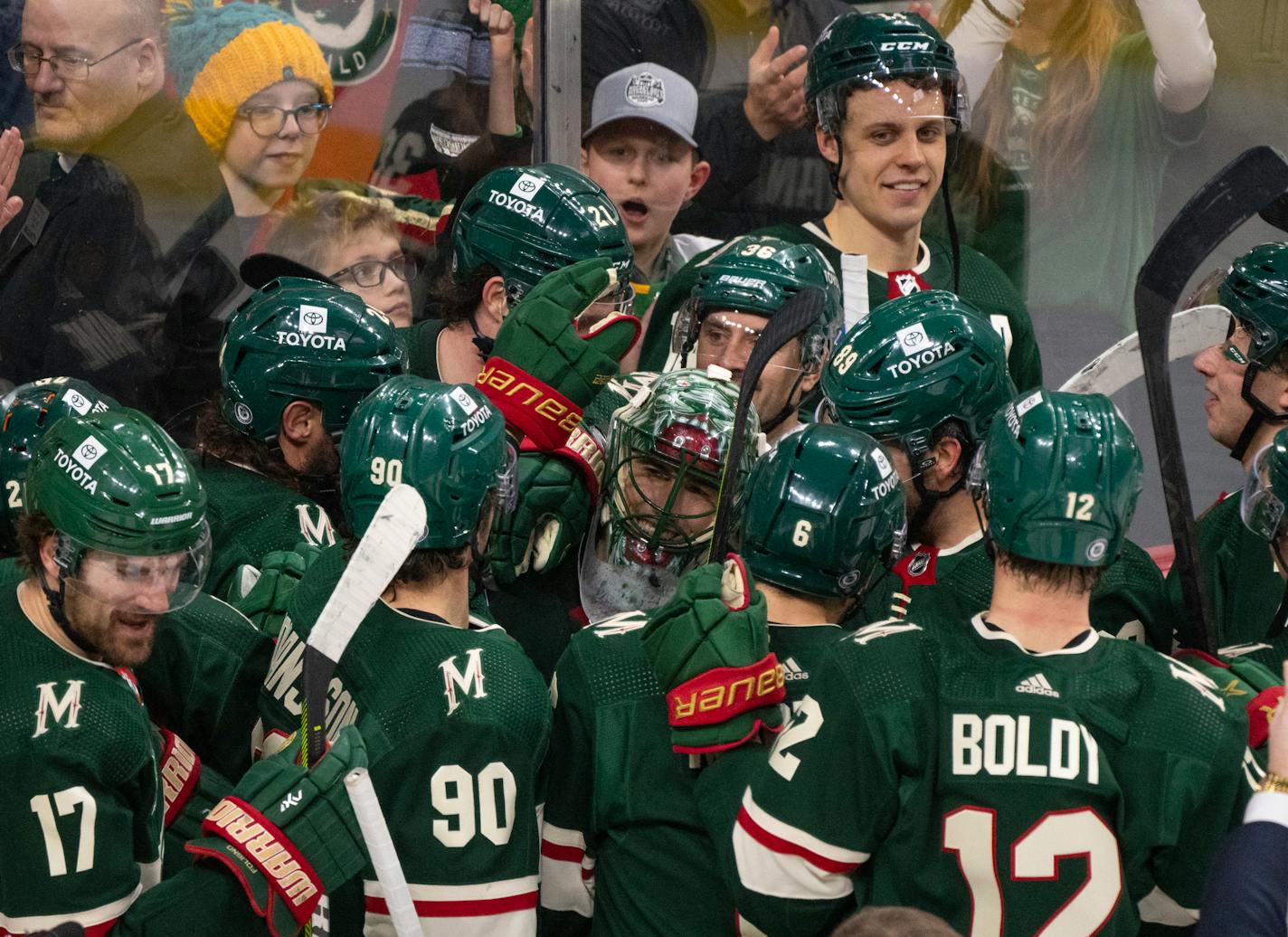 Minnesota Wild goaltender Marc-Andre Fleury (29) was mobbed by his teammates at the end of the game. Fleury's 552nd career win meant he passed Patrick Roy to become second-most winning goalie in NHL history with the shut out. The Minnesota Wild shut out the New York Islanders 5-0 in an NHL hockey game Monday night, January 15, 2023 at Xcel Energy Center in St. Paul. ] JEFF WHEELER • Jeff.Wheeler@startribune.com