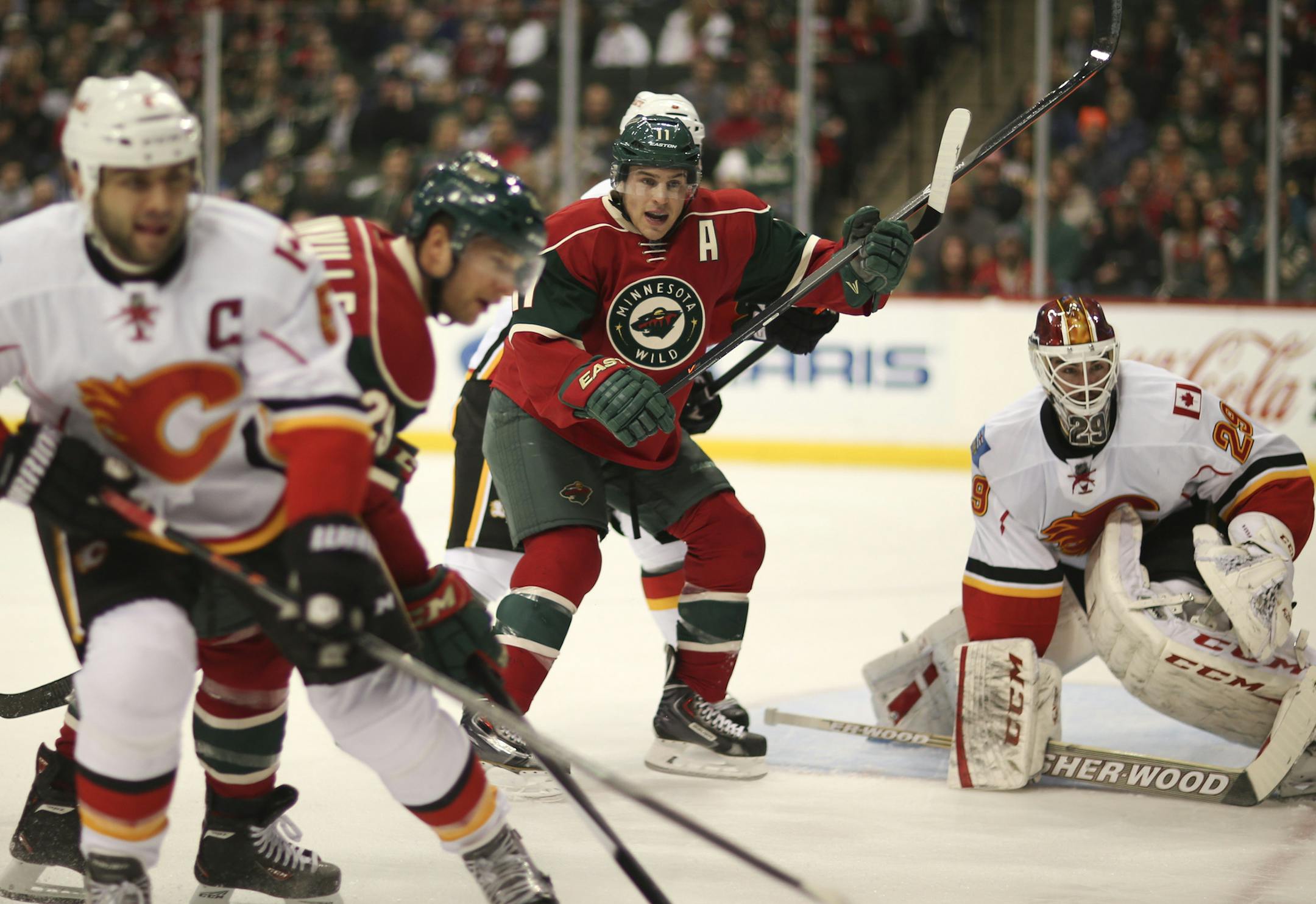 The Minnesota Wild faced the Calgary Flames in an NHL hockey game Monday night, March 3, 2014 at Xcel Energy Center in St. Paul. The Wild's Zach Parise signaled for a pass from the corner as he skated towards Flames goaltender Reta Berra in the first period. ] JEFF WHEELER &#x201a;&#xc4;&#xa2; jeff.wheeler@startribune.com