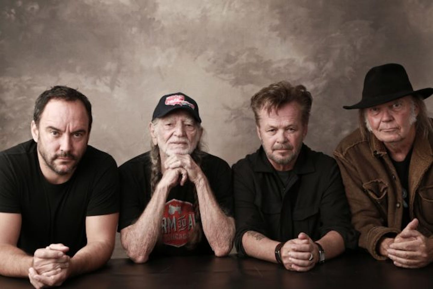 Farm Aid's chairmen of the board: Dave Matthews, Willie Nelson, John Mellencamp and Neil Young. / Marc Houser, FarmAid.org