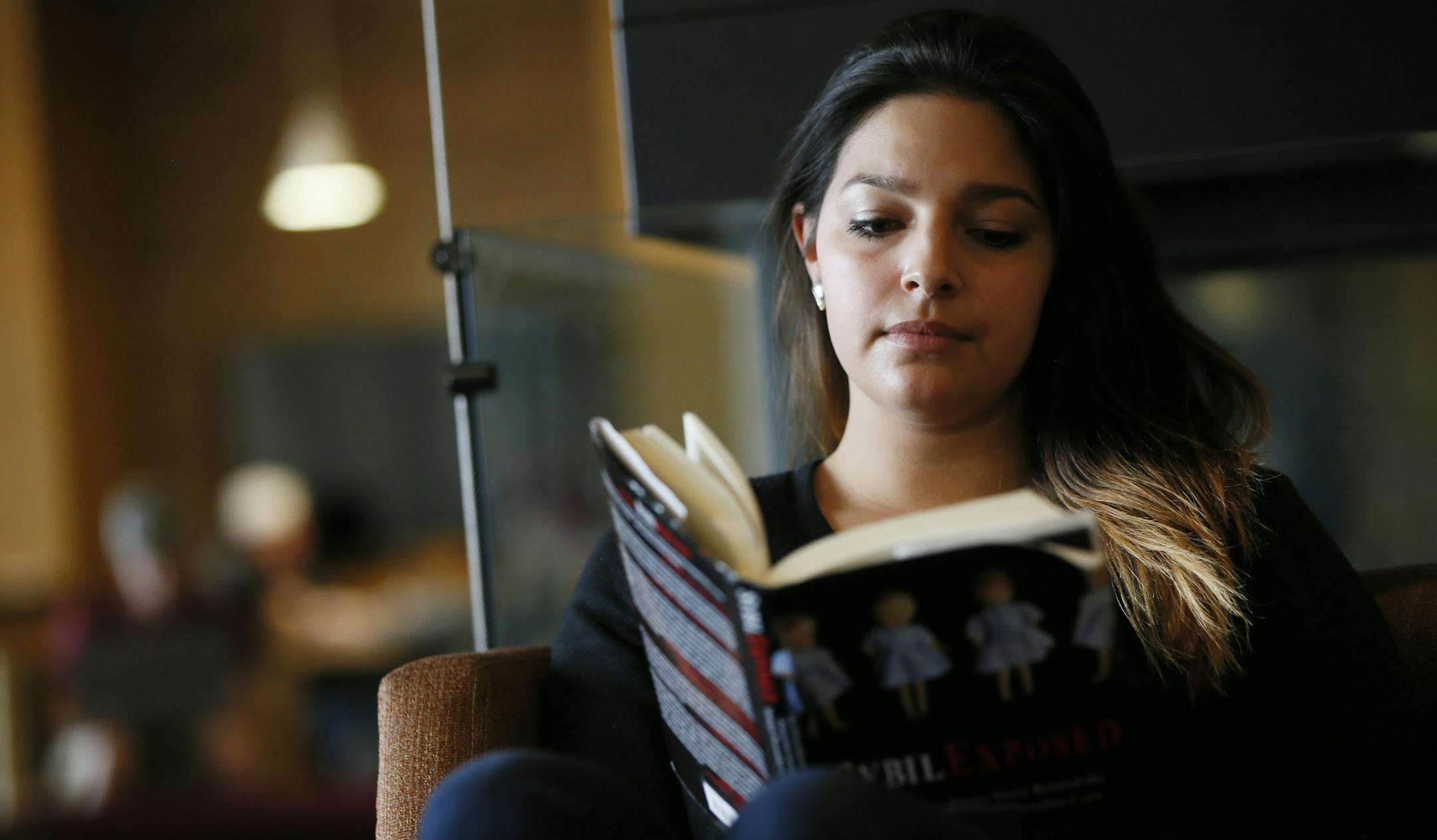 Amelia Delao-Peterson, 21, of St. Cloud read a book in the student center on UMD campus, relaxing after her last final exam. A recent transfer student, she wasn't aware the Duluth campus was having budget problems. "I don't really hear much about budget cuts," she admitted."I never thought twice about the budget." University of Minnesota Duluth chancellor, Lendley Black hosted a "Town Hall" meeting for faculty, staff and students to give and update on the progress toward digging the Duluth campu