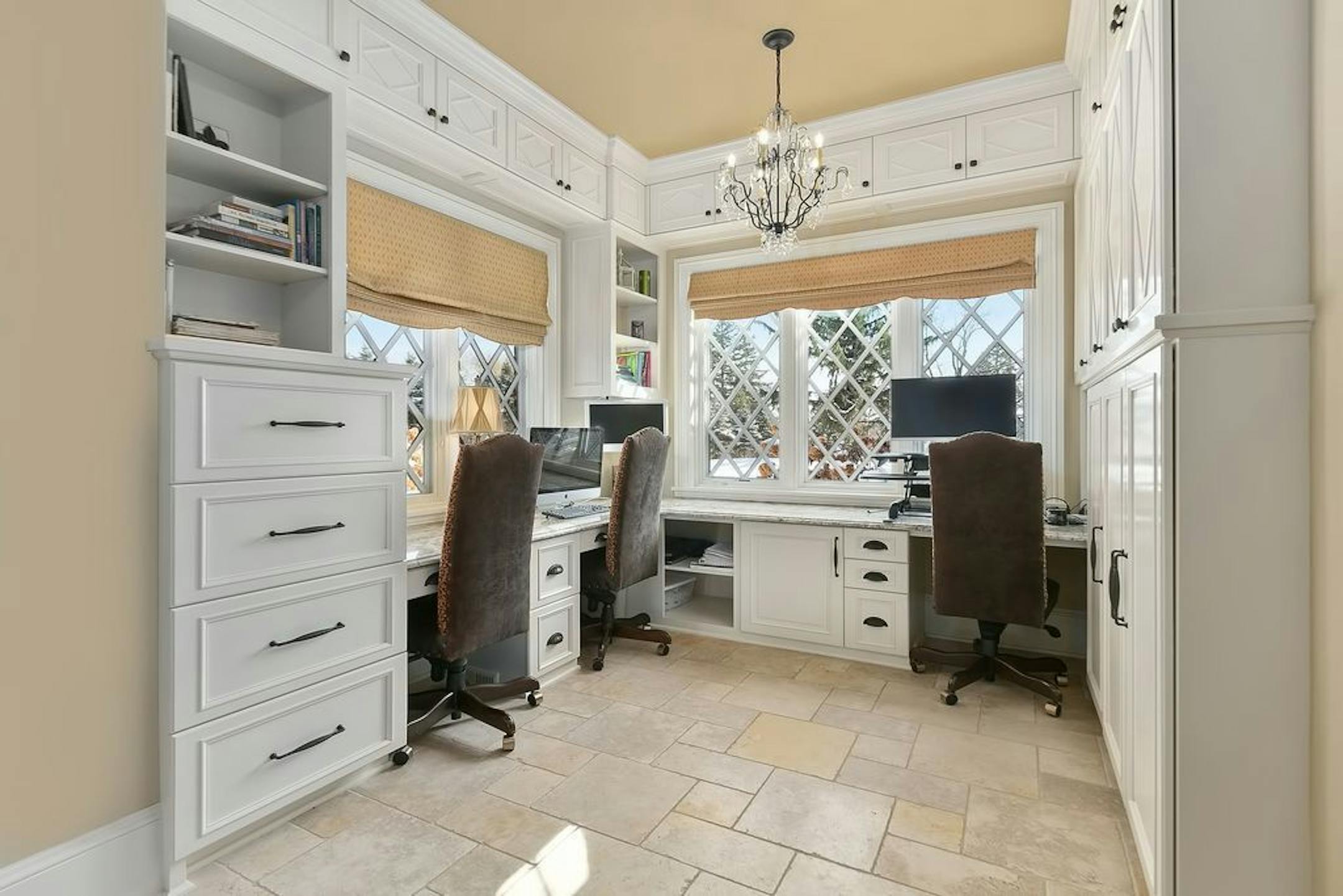 This room off the kitchen can serve as an office or homework station.