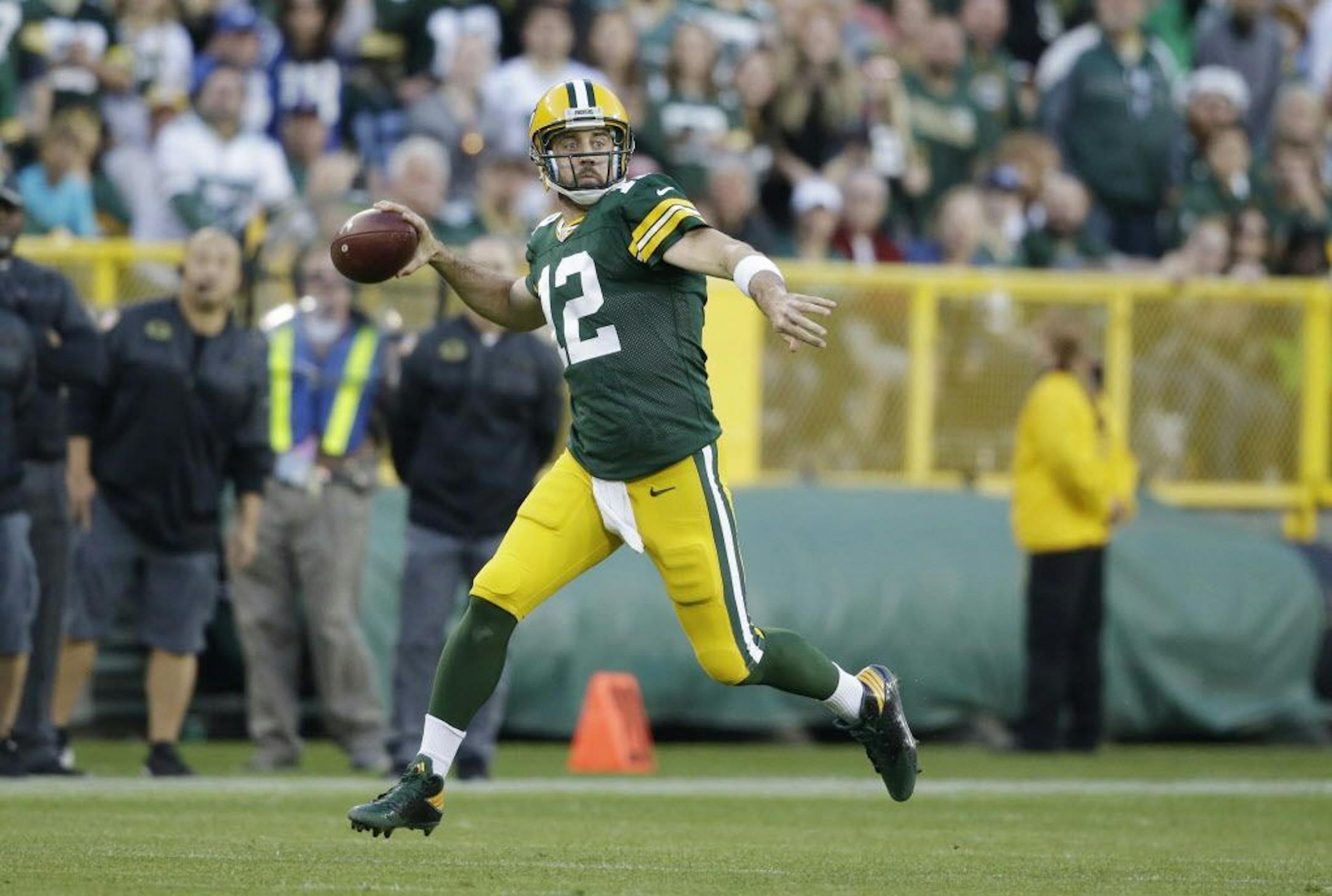 FILE - In this Nov. 6, 2016, file photo, Green Bay Packers' Aaron Rodgers throws during the first half of an NFL football game against the Indianapolis Colts, in Green Bay, Wis. The Packers need to beat the Seahawks Sunday to keep pace with first-place Detroit in the NFC North.