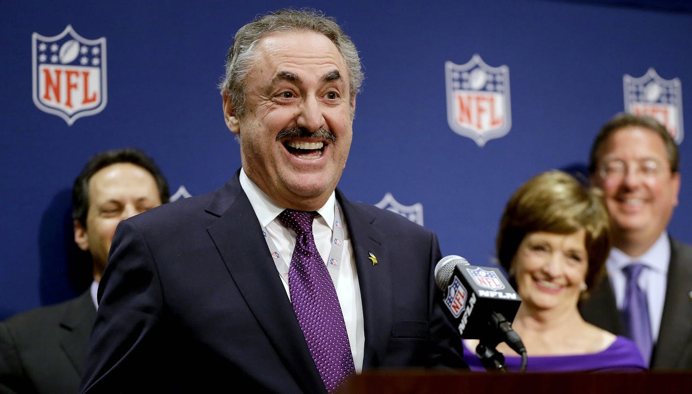 Minnesota Vikings owner Zygi Wilf speaks at a news conference after Minneapolis was selected as the host for 2018 Super Bowl at the NFL's spring meetings, Tuesday, May 20, 2014, in Atlanta. Minneapolis will host the 2018 Super Bowl after a vote by owners on Tuesday rewarded the city for getting a new stadium deal. The owners chose Minneapolis and the new $1 billion stadium planned for the site of the old Metrodome to host the championship over New Orleans and Indianapolis. (AP Photo/David Goldma