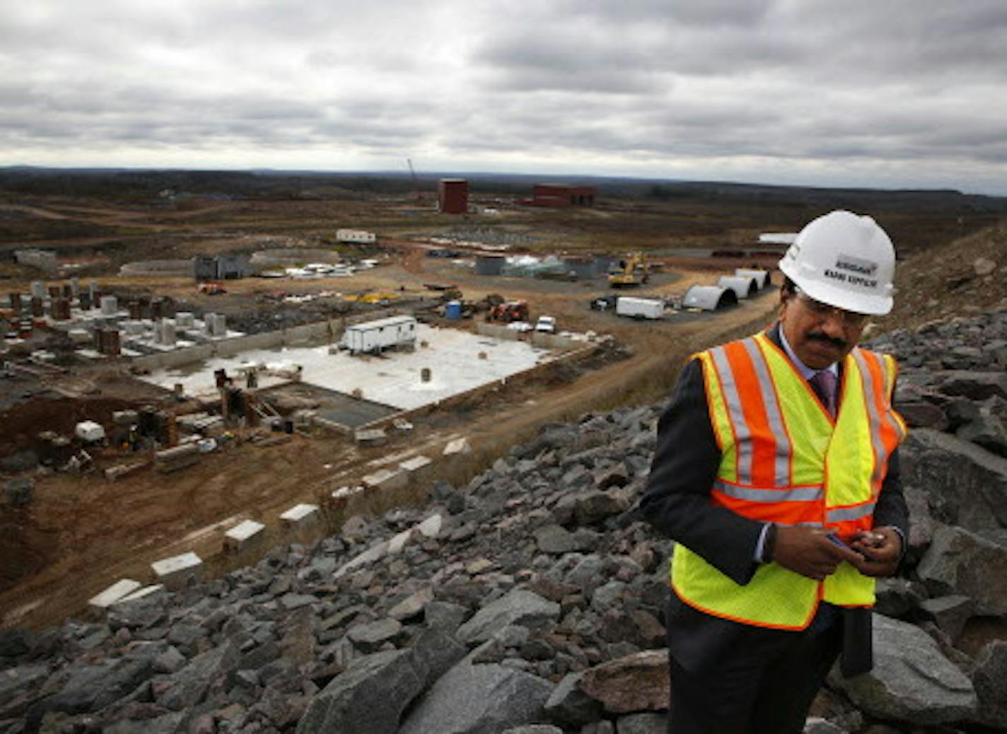 Madhu Vuppuluri, president and CEO of Essar Steel Minnesota, looks over the Essar Project in Nashwauk, Minn. Essar Steel Minnesota recently ramped up construction on an $1.8 billion taconite plant after securing the funding needed to complete the project.