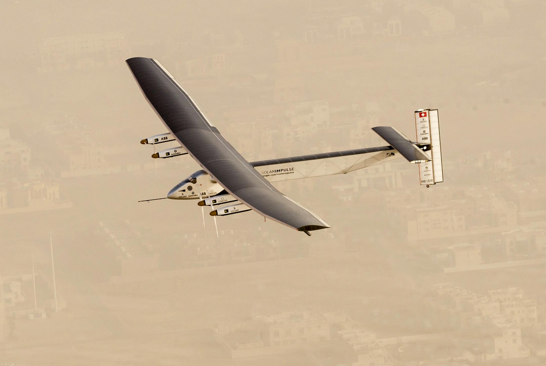 In this photo released by Solar Impulse, "Solar Impulse 2", a solar-powered airplane flies after taking off from Al Bateen Executive Airport in Abu Dhabi, United Arab Emirates on Monday, March 9, 2015, marking the start of the first attempt to fly around the world without a drop of fuel. Solar Impulse founder Andre Borschberg was at the controls of the single-seater when it took off from the airport. Borschberg will trade off piloting with Solar Impulse co-founder Bertrand Piccard during stop-ov