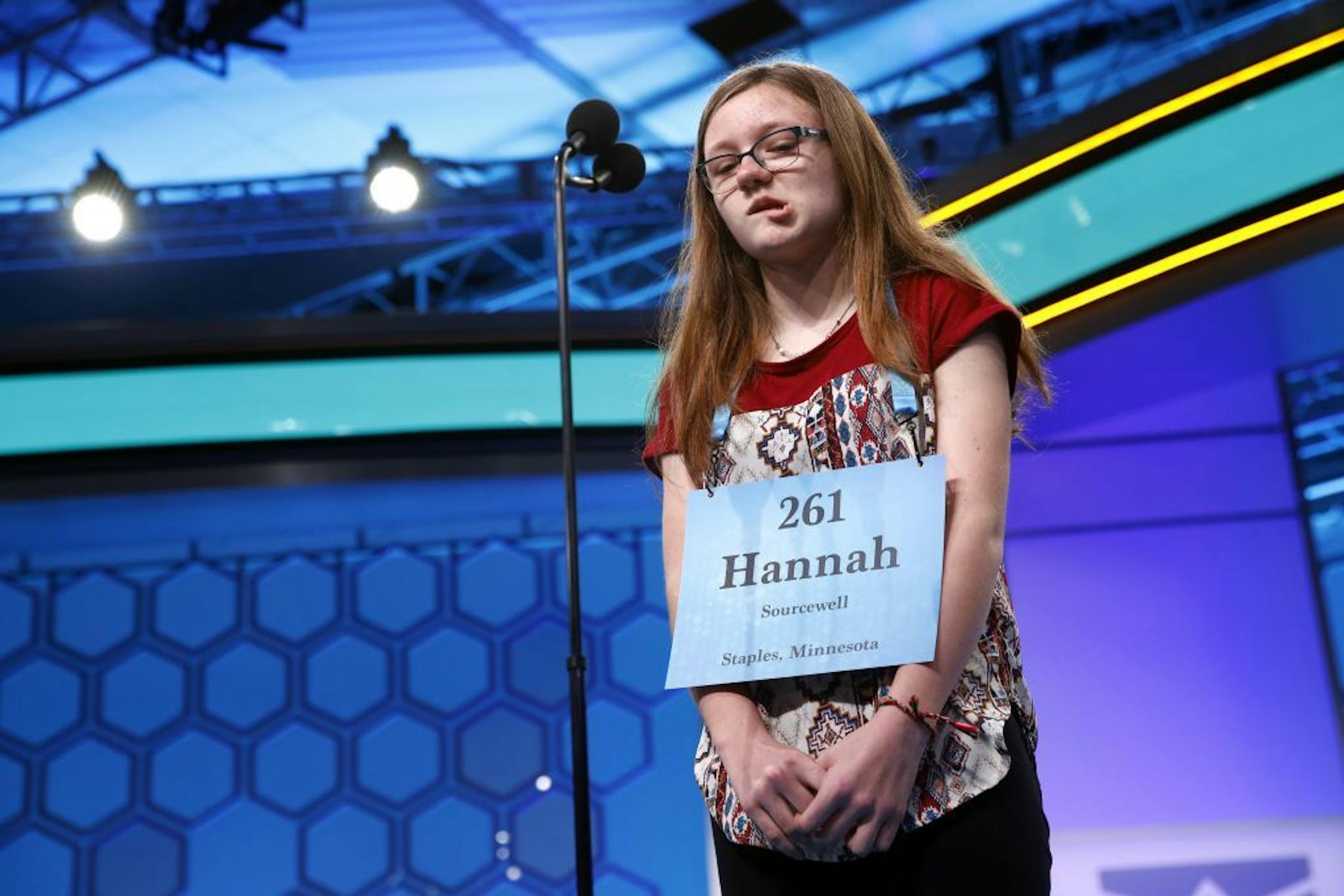 Hannah Moddes, 12, of Baxter, Minn., competes in the third round of the Scripps National Spelling Bee, Wednesday, May 29, 2019, in Oxon Hill, Md.