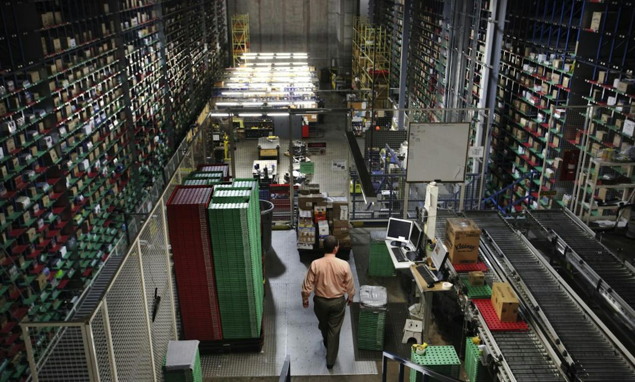 Grocery items are stacked multiple layers high at the Supervalu's grocery distribution center Wednesday, Jan. 23, 2013, in Hopkins, MN. Supervalu has 1.7 million square feet of distribution space.