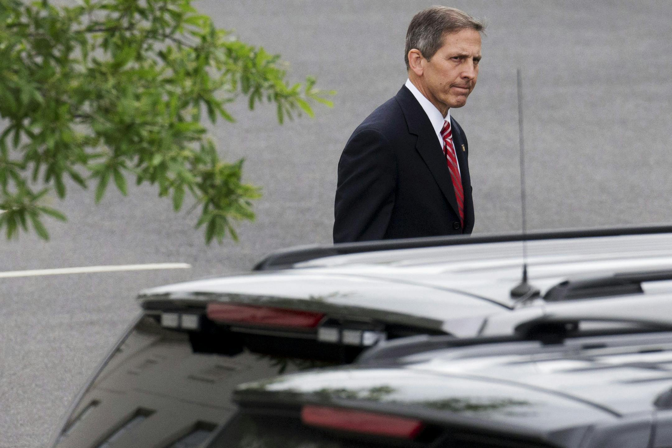 Deputy Veterans Affairs Secretary Sloan Gibson leaves the White House in Washington, Friday, May 30, 2014, after being named by President Barack Obama to run the Veterans Affairs Department on an interim basis while Obama searches for a replacement for Veterans Affairs Secretary Eric Shinseki who resigned Friday. (AP Photo/Jacquelyn Martin)