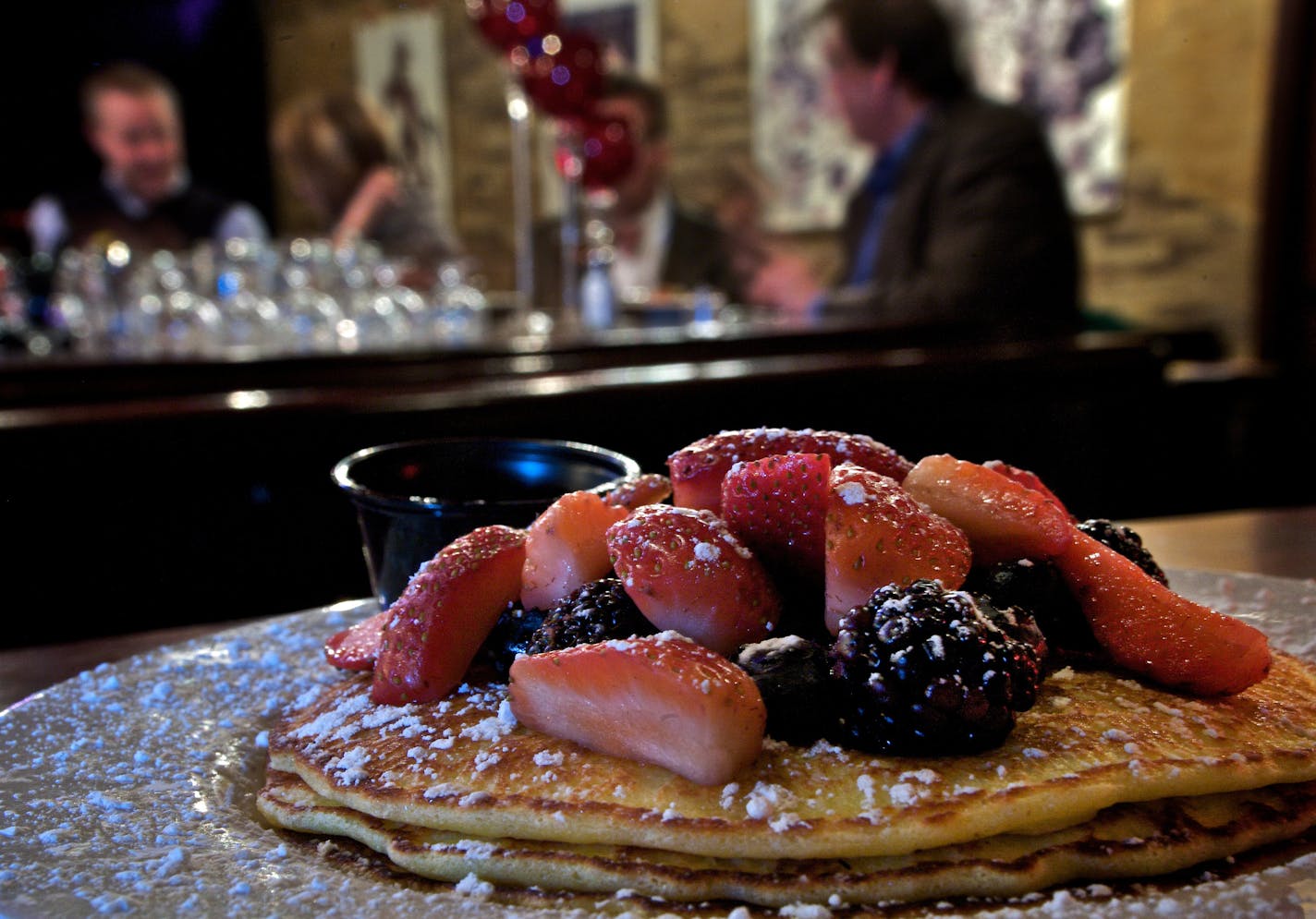 Hell's Kitchen's menu says breakfast all day, and this offering of Lemon-Ricotta hotcakes fits the bill. Three hotcakes, made with freshly grated lemon zest and whole-milk ricotta, are topped with fresh berries and maple syrup.