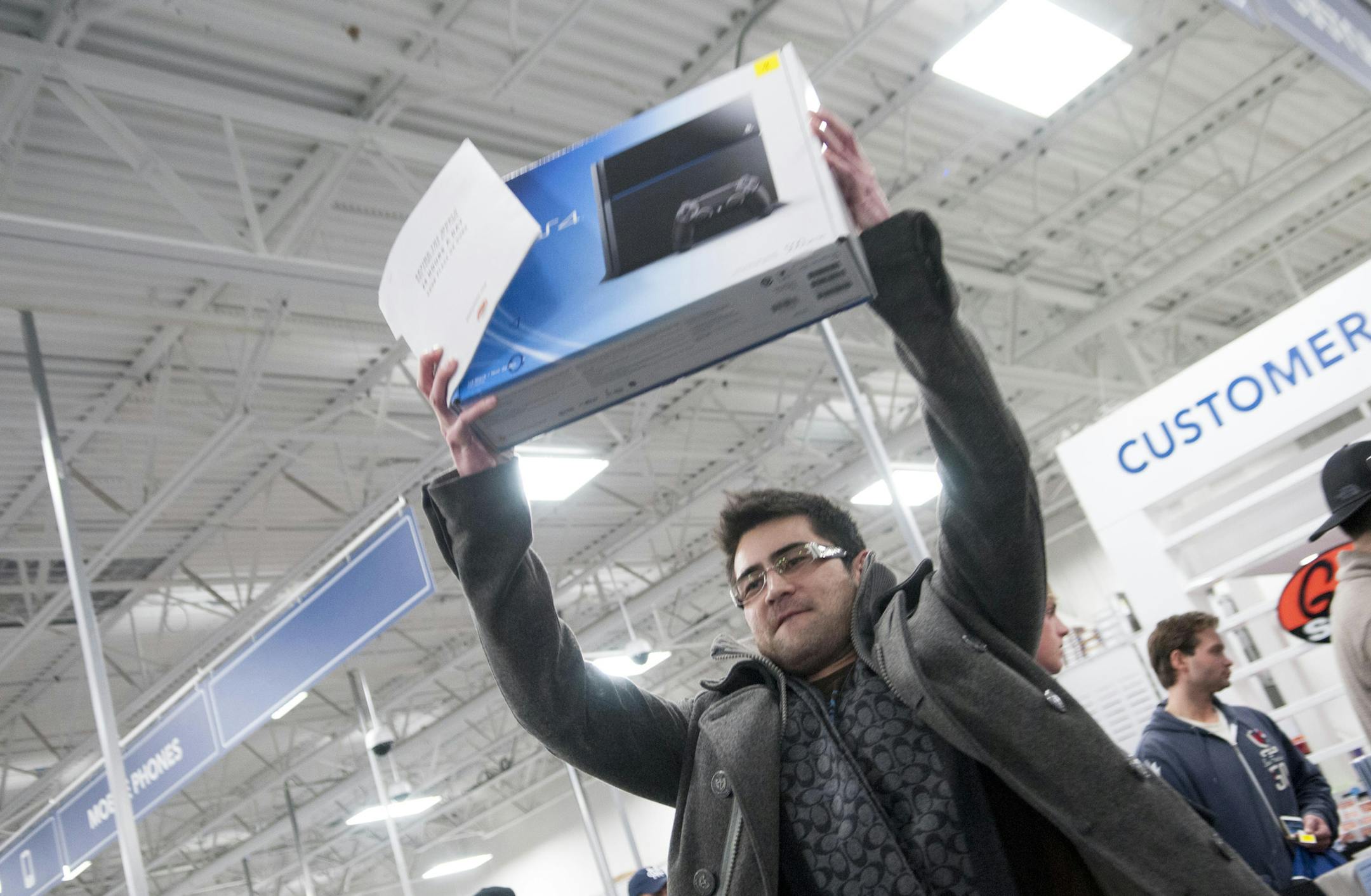 Customers at the Best Buy store in Richfield, Minn. to be the first to buy the PlayStation 4 at 12:01 a.m. Friday, Nov. 15 (Photo Credit: Best Buy)