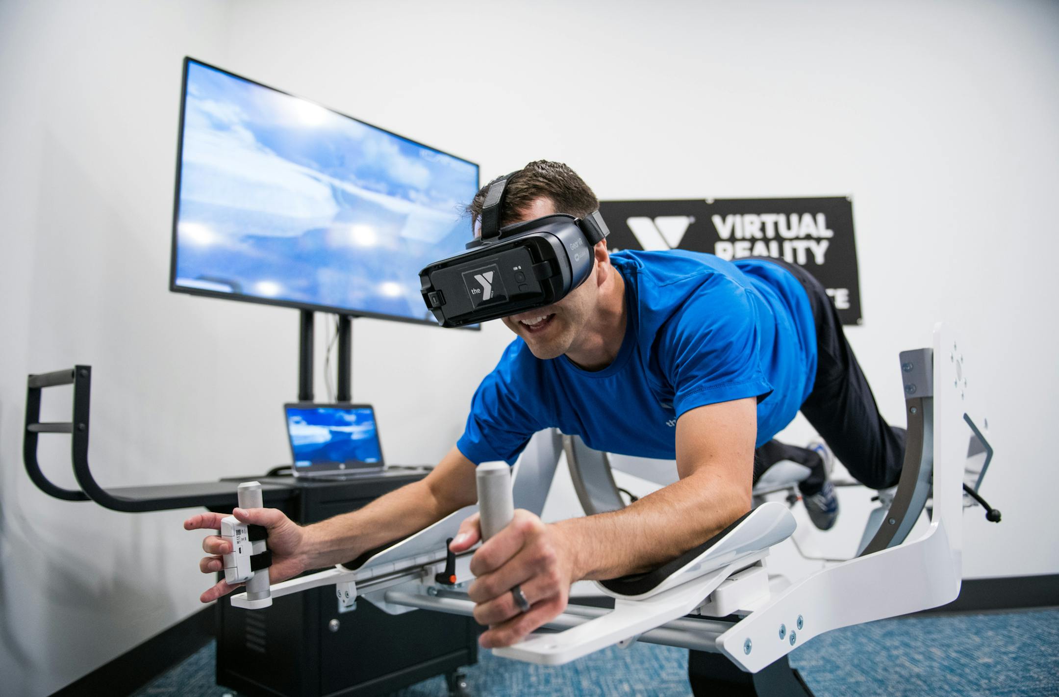 Nathan Maehren of the YMCA of the Greater Twin Cities demonstrated a machine that combines a core workout with a virtual reality experience.