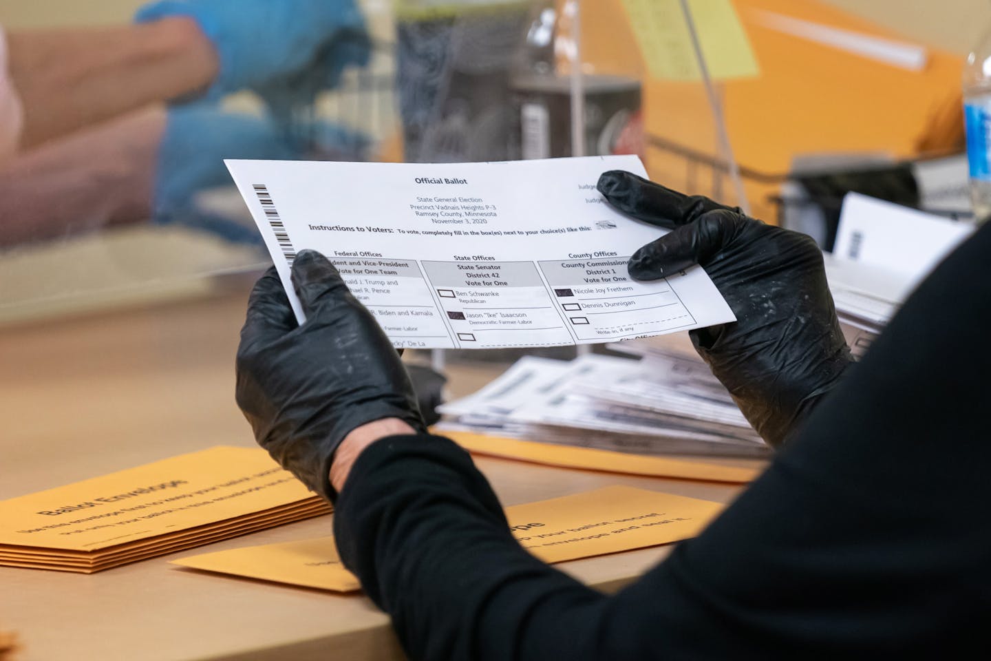 Ramsey County election judges processed early voting ballots Oct. 27.