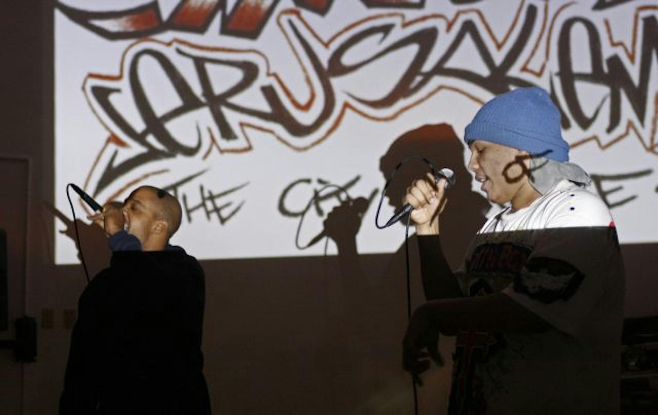 Hip-hop duo Gerald Shepherd, left, and Donnie Smith, also known as G Shep and D Train, performed. Rappers took turns at the mike during the service.