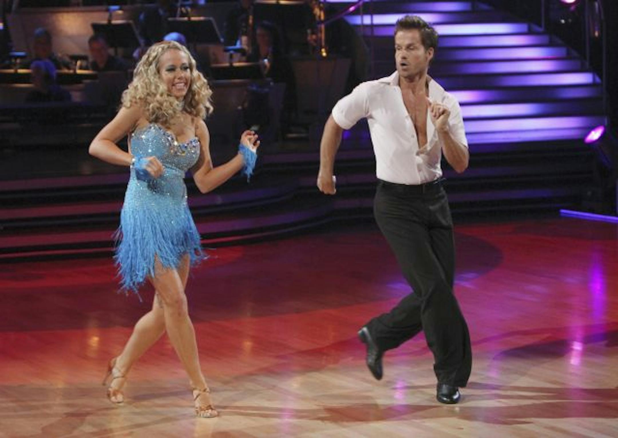 TV personality Kendra Wilkinson, left, performs with her partner Louis Van Amstel on "Dancing with the Stars."