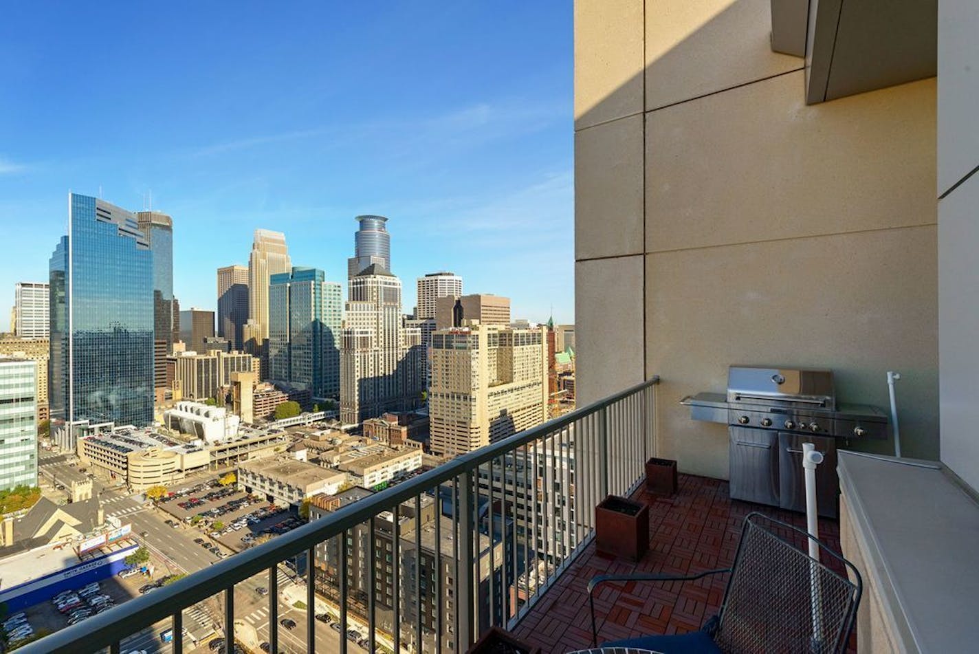 Views of downtown Minneapolis skyscrapers off the balcony.