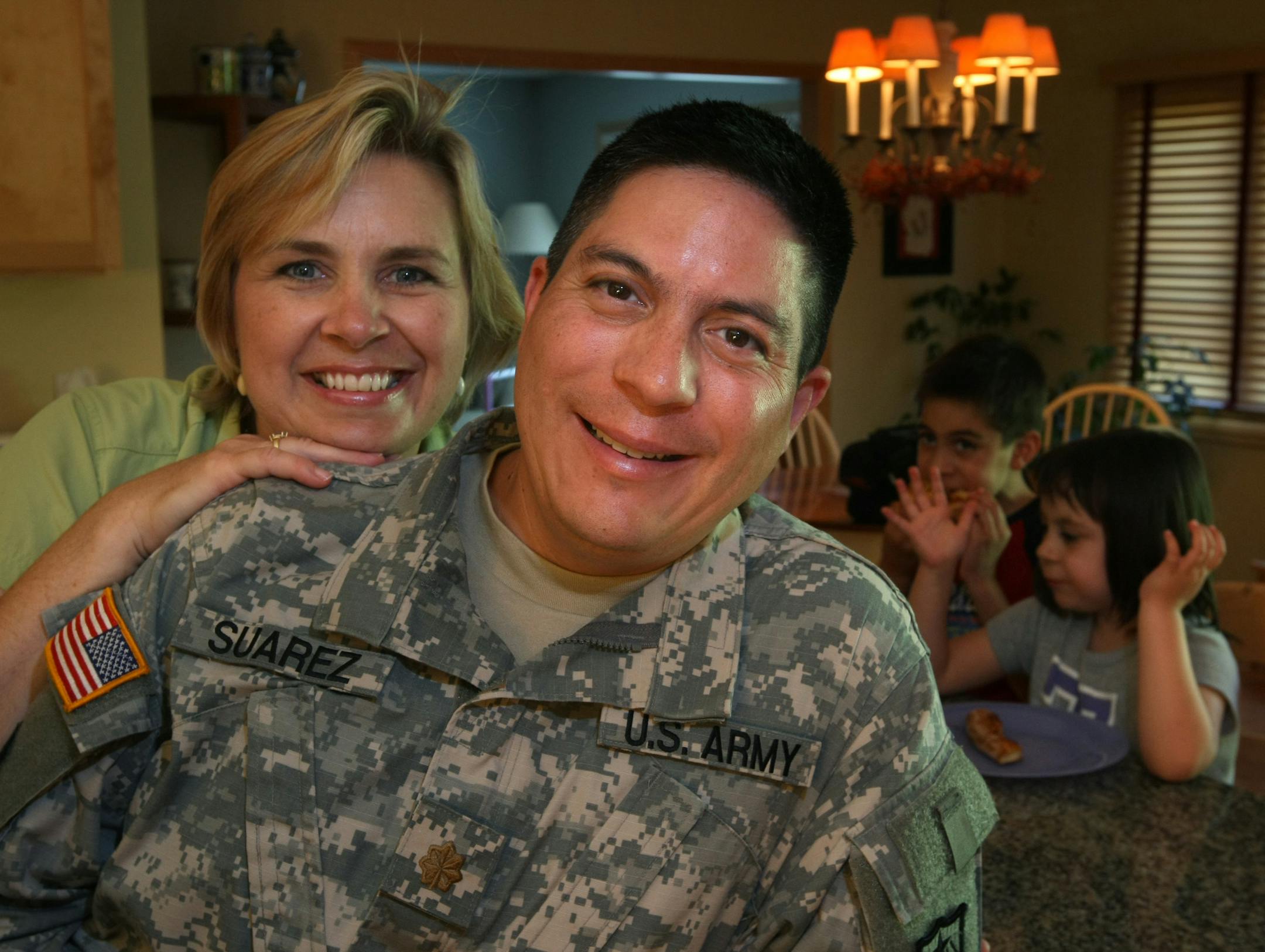 Maj. Eduardo Suarez, who has been married for 18 years to his wife, Jennifer, has done two tours in Iraq with the Minnesota Guard.
