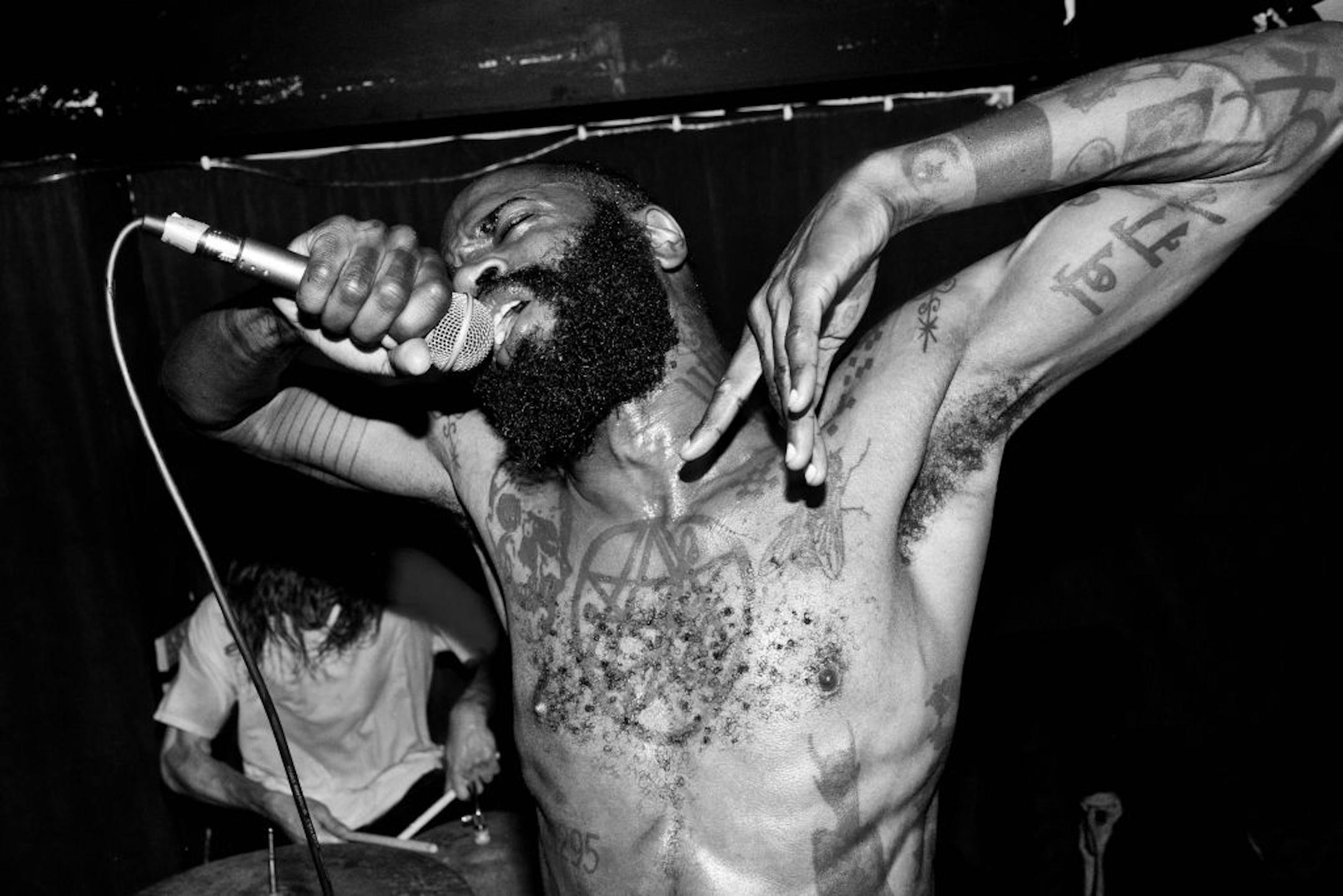Publicity photo of Death Grips playing the Captain's Rest