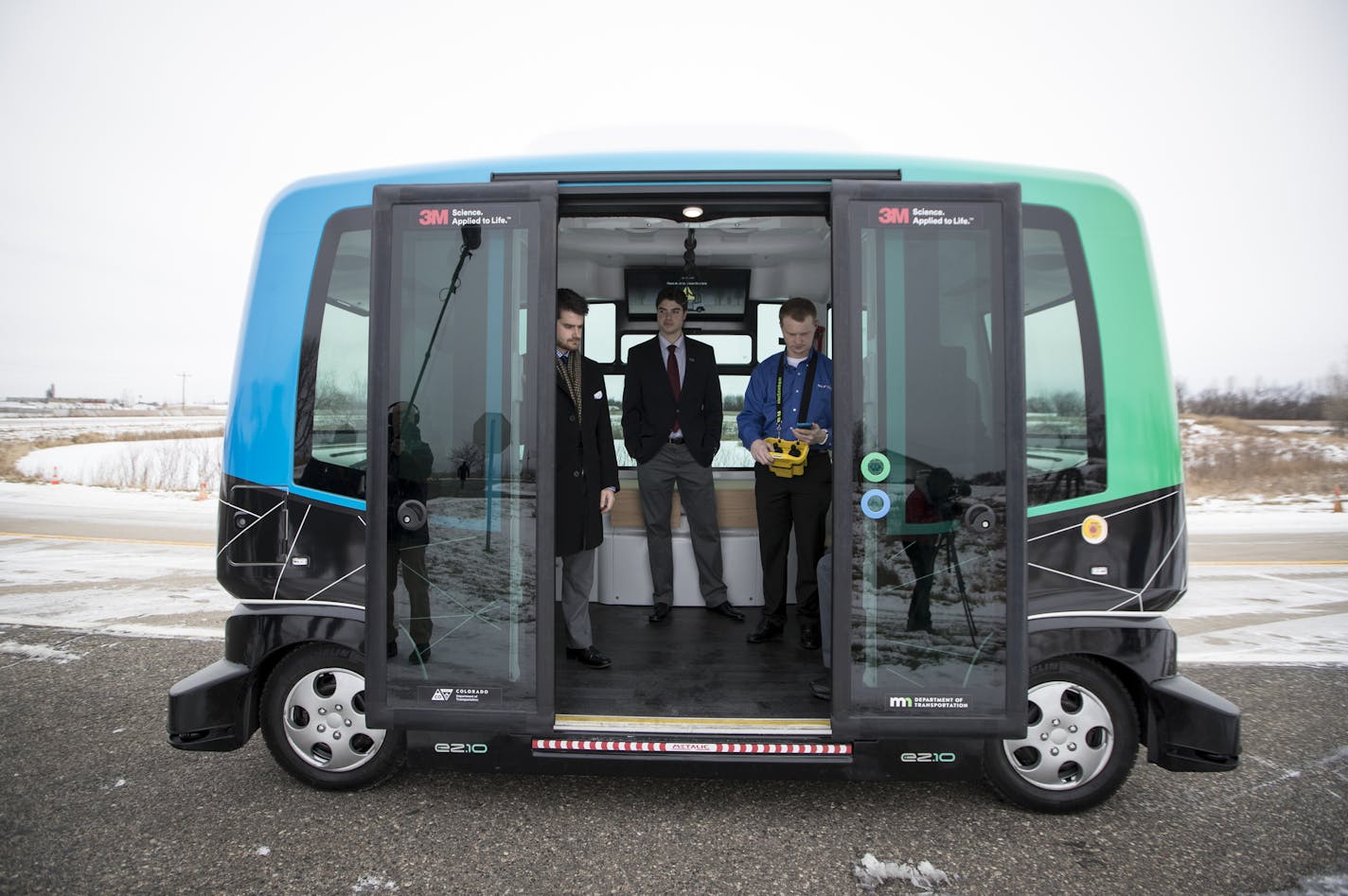 MnDOT is held a press event at the research center in Monticello, Minn. to introduce its autonomous bus they have been testing in harsher Minnesota condition on Tuesday, December 12, 2017. The bus is level 4 autonomous and fits about 10 people. In the bus are Joseph Holmes with Easy Mile, Michael Kronzer, with MnDot and a man who was operating the vehicle that was struggling in the cold and snowy weather.