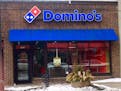 A delivery person for this Domino's on Hennepin Avenue was shot in an apparent robbery.