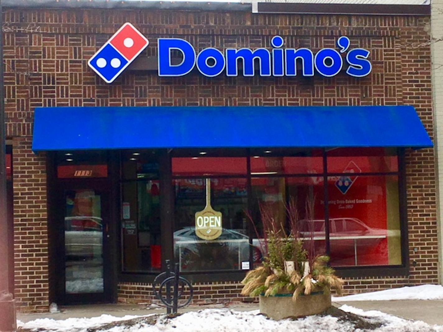 A delivery person for this Domino's on Hennepin Avenue was shot in an apparent robbery.