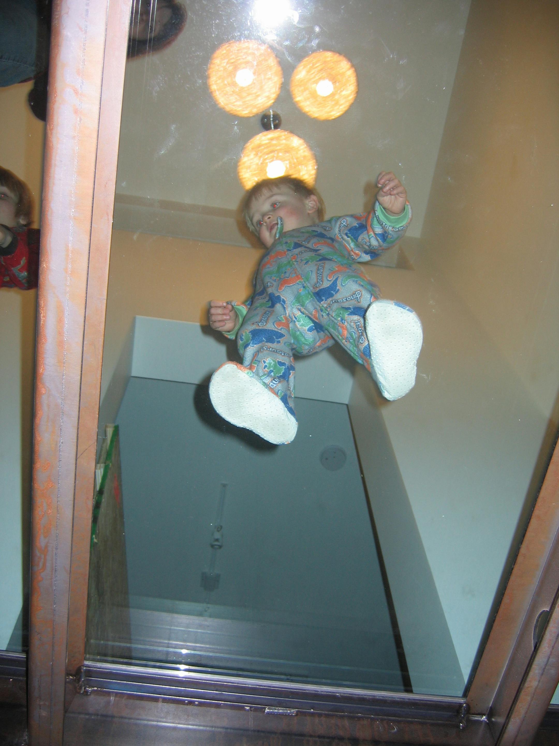 One of the Hammond children tests out the new glass landing.