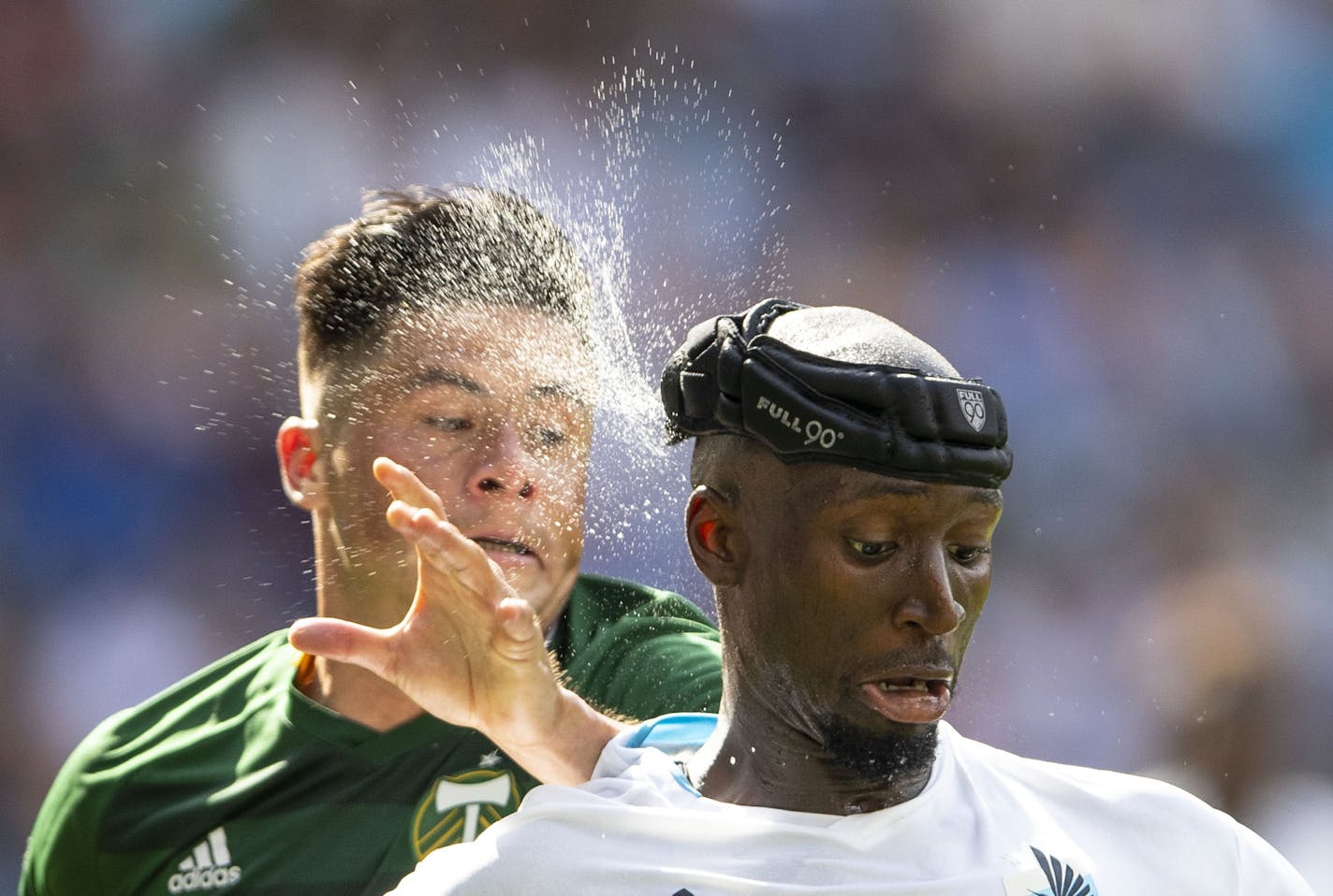 Minnesota FC defender Ike Opara (3) had sweat fly off his head during an especially hot game day.] ALEX KORMANN &#x2022; alex.kormann@startribune.com Minnesota United played Portland FC on Sunday August 4, 2019 at Allianz Field in St. Paul, Minn. The Loons won 1-0 after a penalty kick was converted in the 90'+.