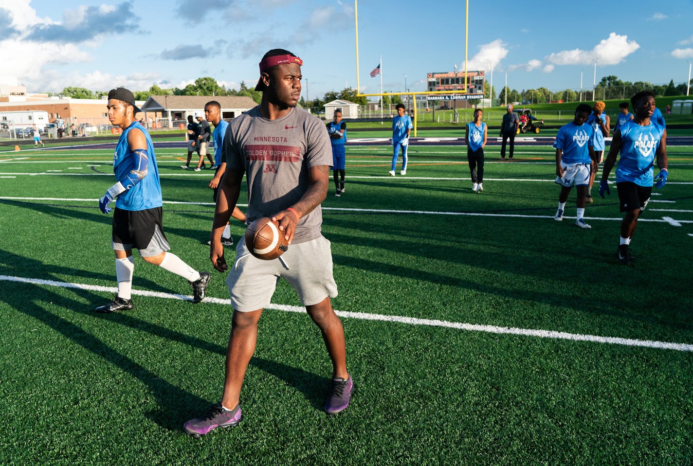 Coaches say Johnson regularly attends practices with is old high school team in his downtime. ] MARK VANCLEAVE ¥ Minnesota Gophers wide receiver Tyler Johnson watched the Minneapolis North high school football team practice against other area teams during a scrimmage at Robbinsdale Cooper High School in New Hope on Wednesday, Jul 10, 2019.