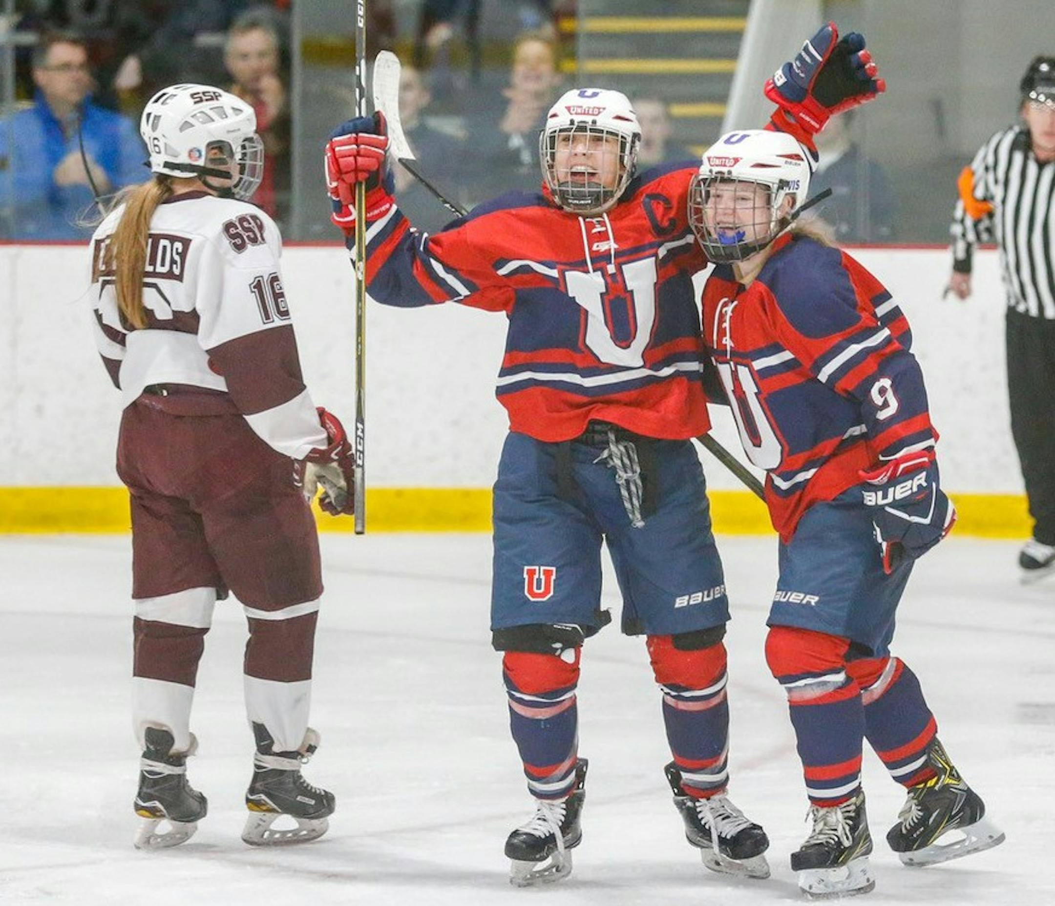 St. Paul United's Catherine Kerin (left) celebrates her second period goal against south St. Paul with teammate Jenna Hoops (right). Kerin's goal gave United a 1-0 over the Packers through two periods. Photo by Jeff Lawler, SportsEngine