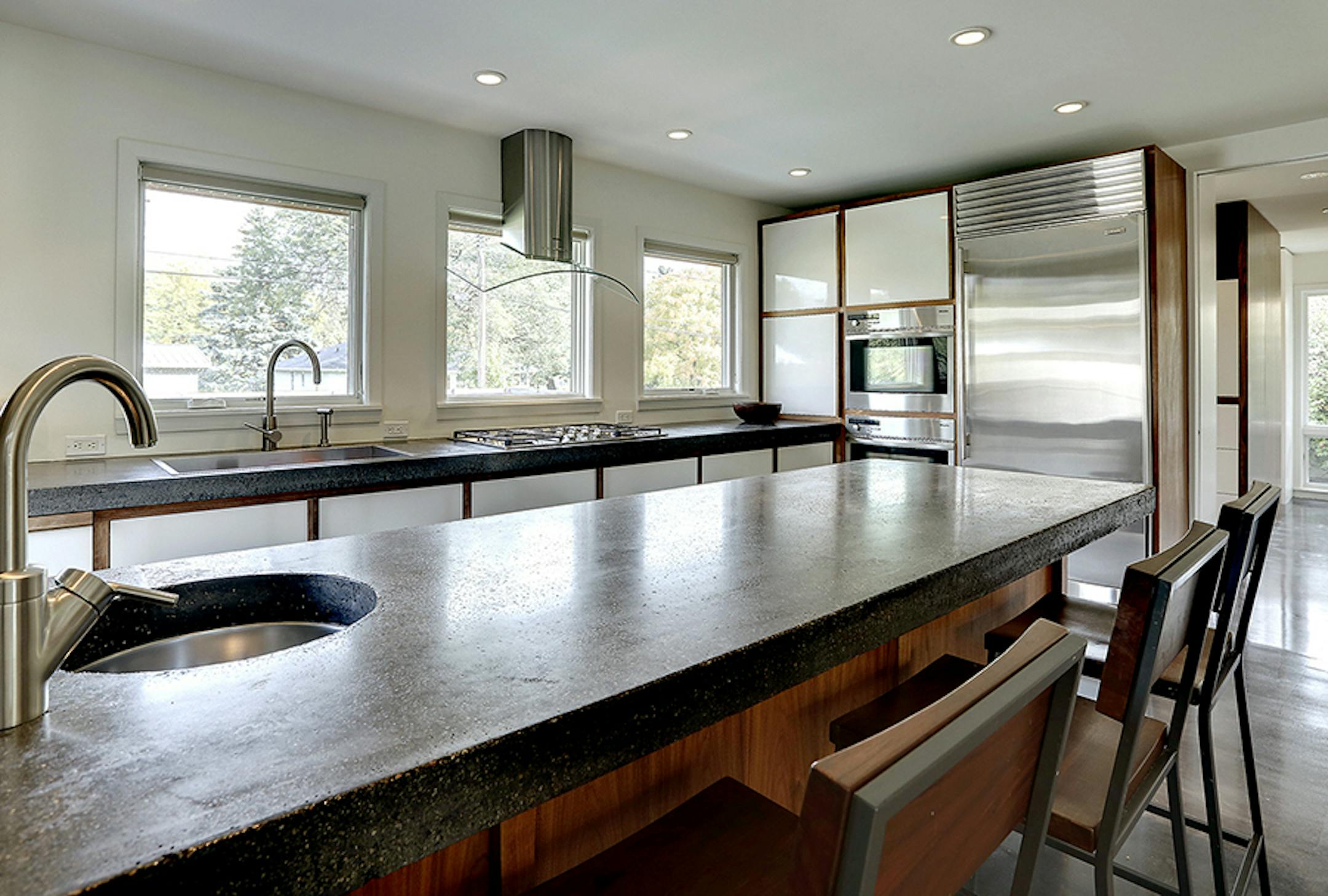 Basswood Ranch. A 1950s rambler was revived with open interiors and refreshed exterior by Peterssen/Keller Architecture.