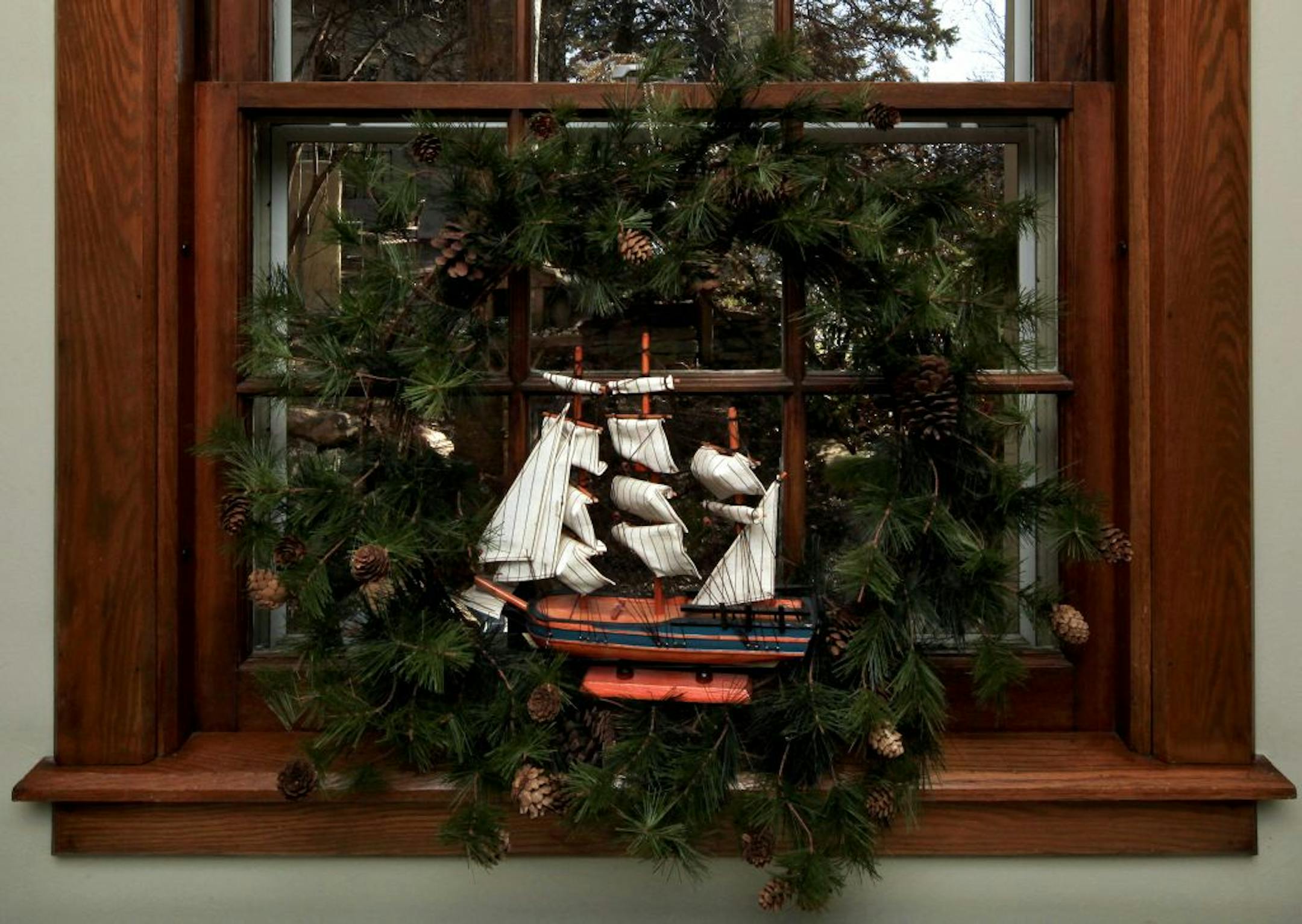 Decorating a home for the holidays when it's on the market for sale. Some agents say owners should keep homes neutral, but others encourage decor to add seasonal warmth and charm. This homeowner (Catherine) decks her home with holiday items she's collected all over the world. November 20, 2012.