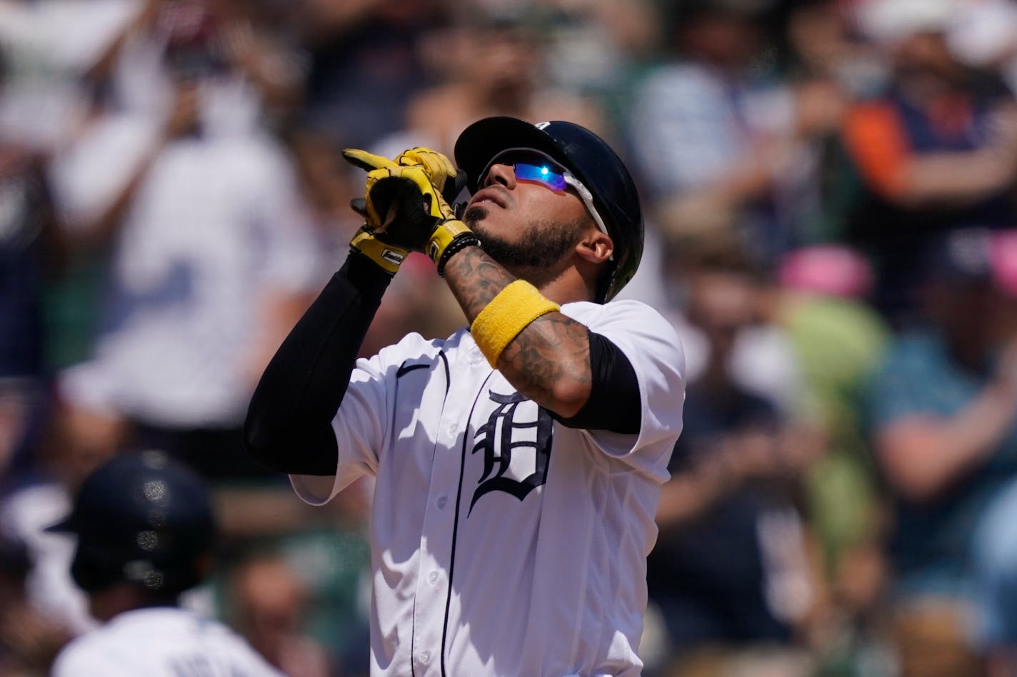 Detroit Tigers' Harold Castro looks skyward as he crosses home plate after his solo home run during the fourth inning of a baseball game against the Cleveland Guardians, Sunday, May 29, 2022, in Detroit. (AP Photo/Carlos Osorio)