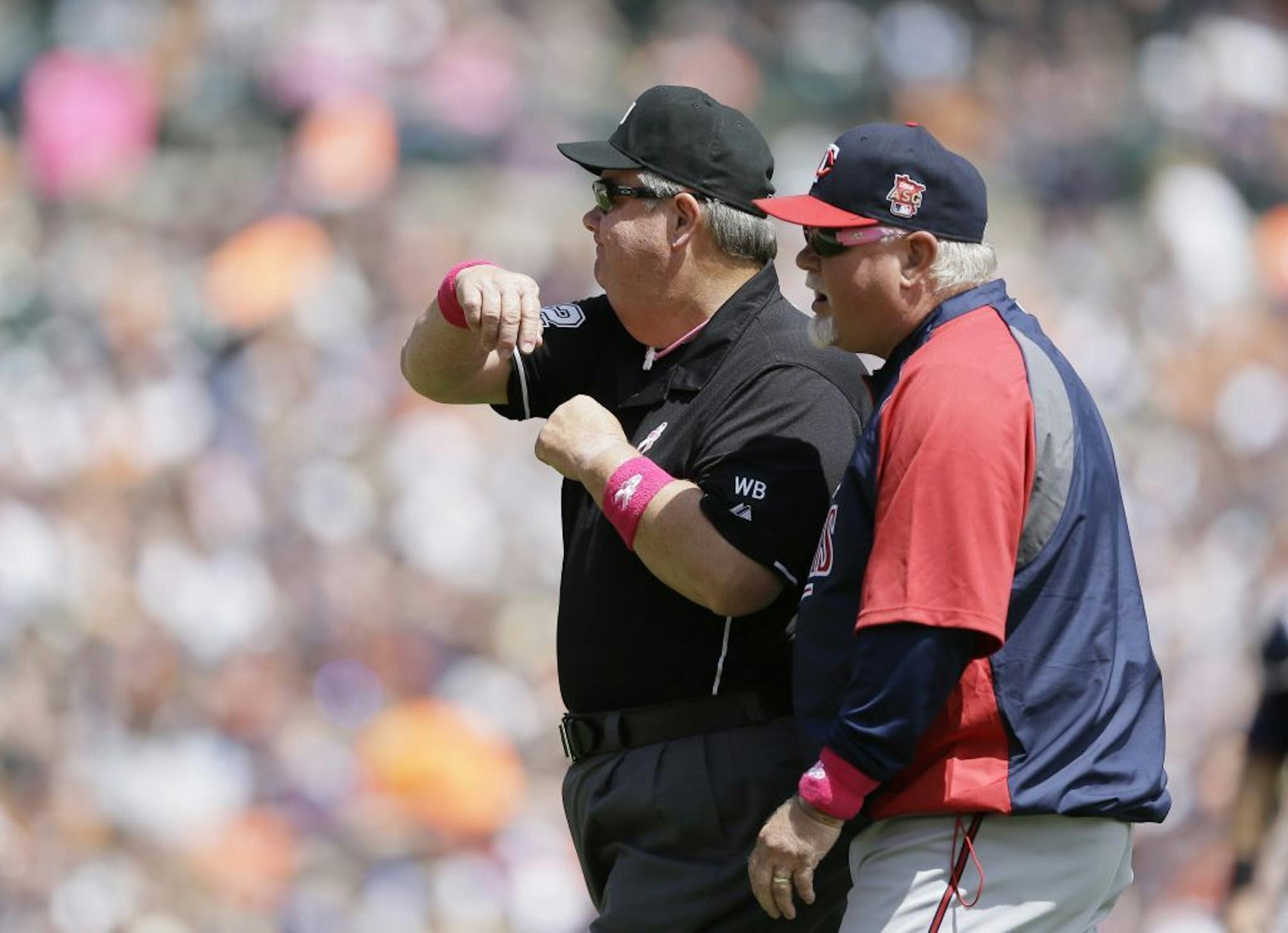 Former Minnesota Twins manager Ron Gardenhire is thrown out by umpire Joe West in 2014.