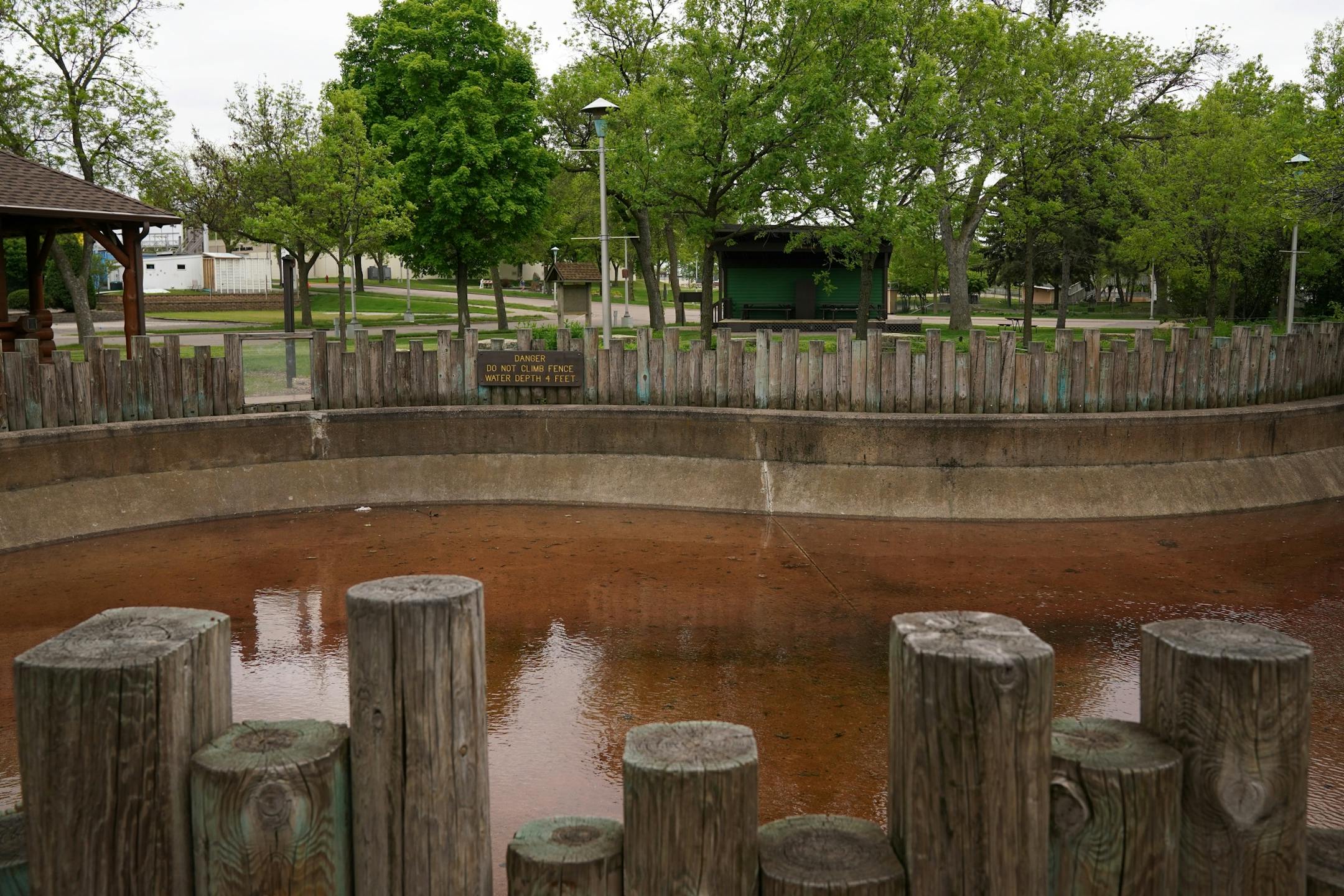 A pool that normally houses various species of fish outside the DNR Building sat nearly empty Thursday.