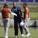 Europe's Tommy Fleetwood, left, and Francesco Molinari greet Tiger Woods of the US after a fourball match on the second day of the 42nd Ryder Cup at L