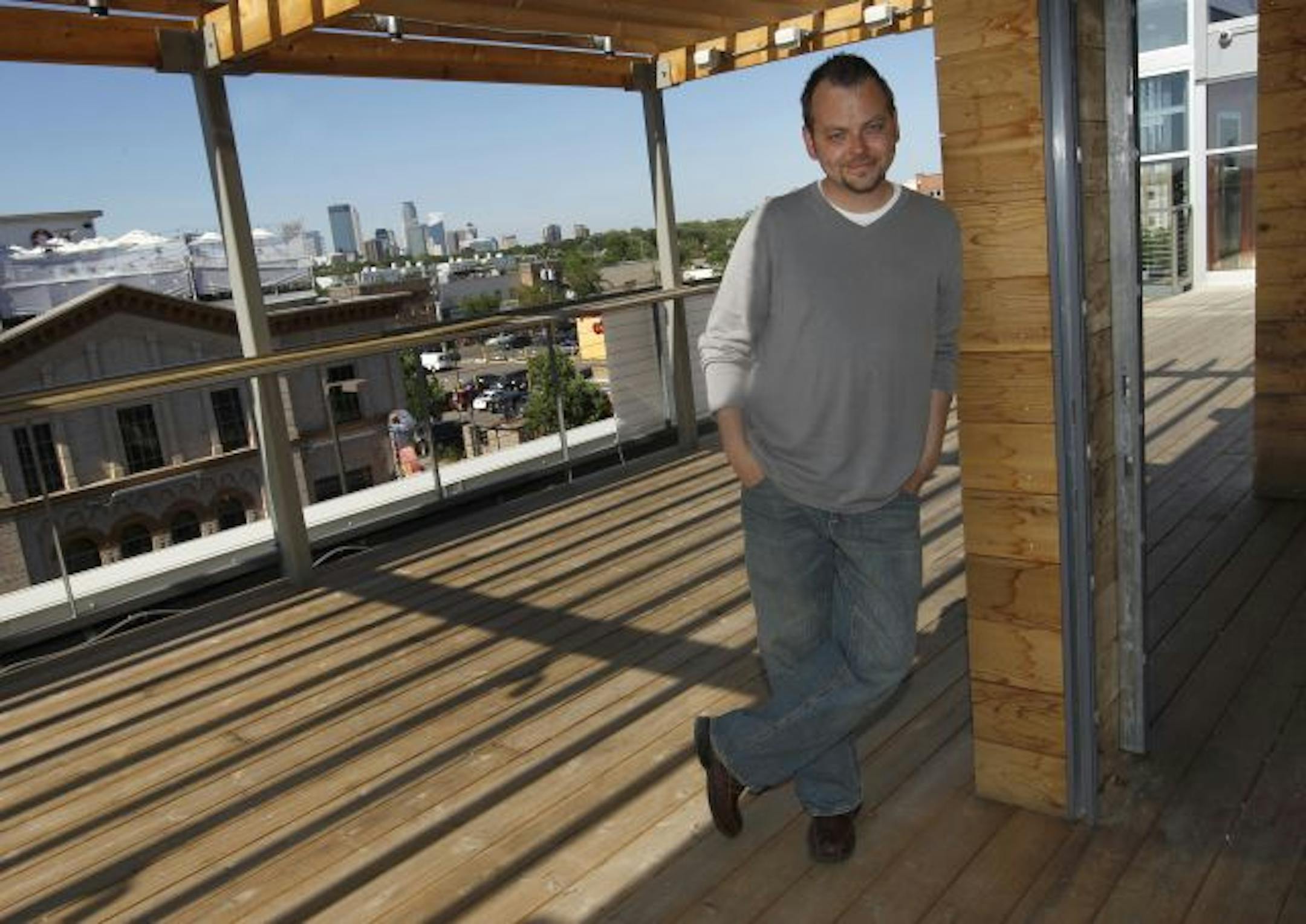 Cafeteria, Calhoun Square, GM Spencer Smith in the rooftop patio space.