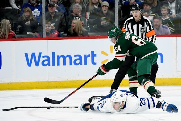 The Wild's Mikael Granlund had the puck after Toronto Maple Leafs' Travis Dermott fell