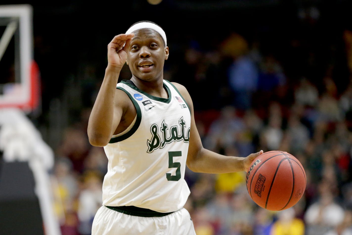 Michigan State's Cassius Winston (5) gestures during the second half of a second round men's college basketball game against Minnesota in the NCAA Tournament, in Des Moines, Iowa, Saturday, March 23, 2019. (AP Photo/Nati Harnik)