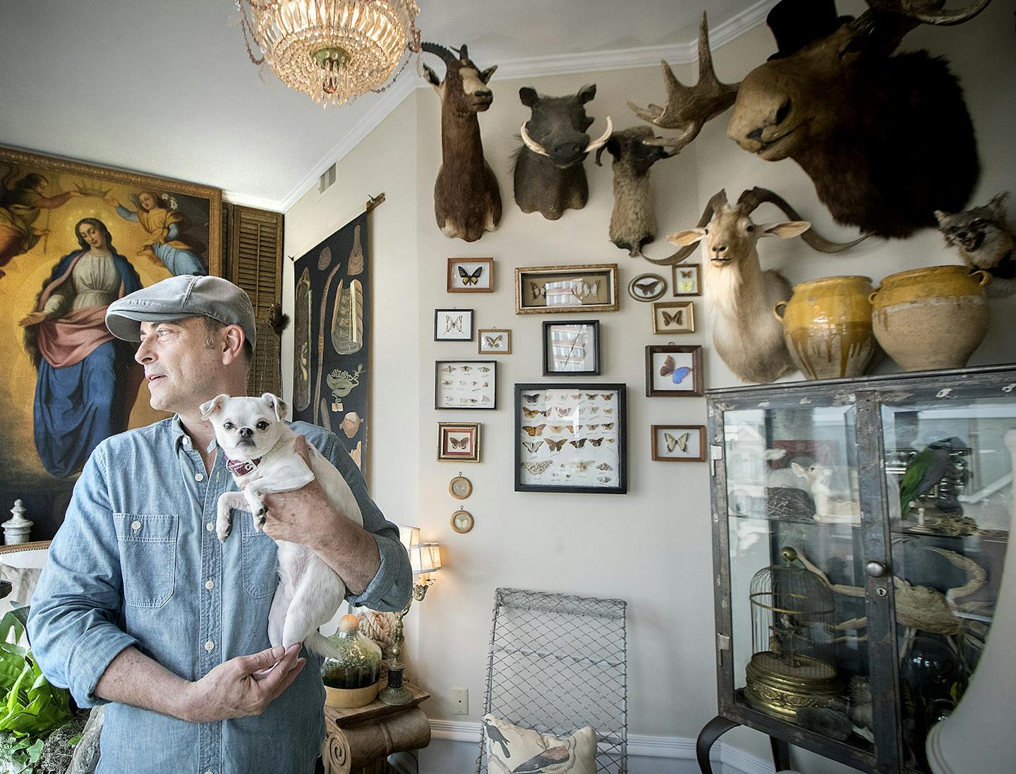 Salon Rouge, owner Richard Staab has created a distinctive home featuring his unusual collectibles including a home filled with mounted animals and religious iconography and a French motif. ] ELIZABETH FLORES &#xef; liz.flores@startribune.com