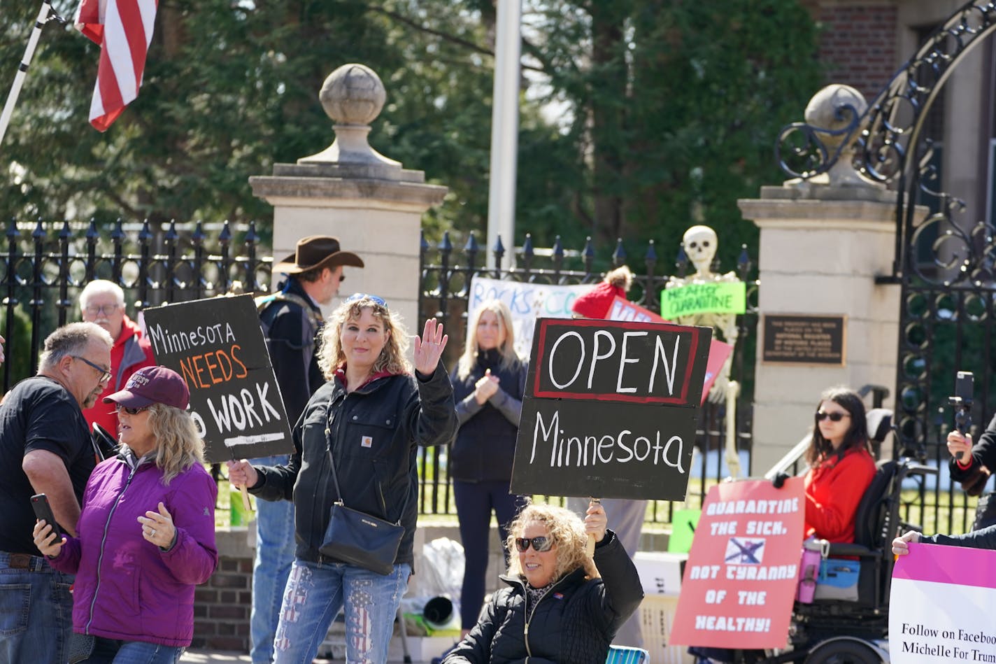 Protesters began to gather outside the Minnesota Governor's Residence an hour before the protest was scheduled to begin. Liberate Minnesota and other groups opposed to Gov. Tim Walz's stay home orders protested outside the governor's residence in St. Paul. ] GLEN STUBBE &#x2022; glen.stubbe@startribune.com Friday, April 17, 2020