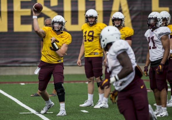 Minnesota quarterback Zack Annexstand throws a pass during practice.